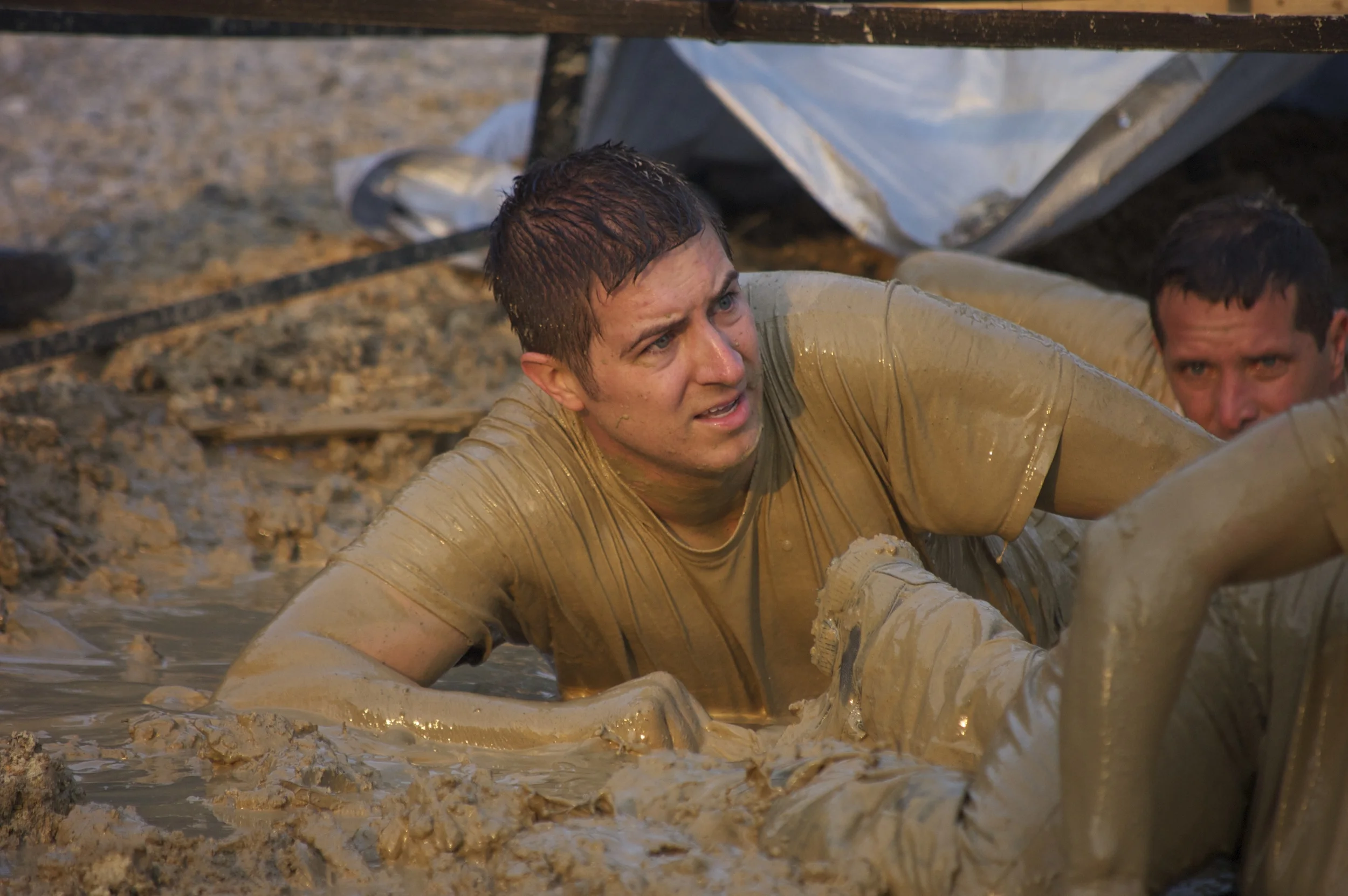 Jordan in the mud pit during the last few hours of SealFit 20x