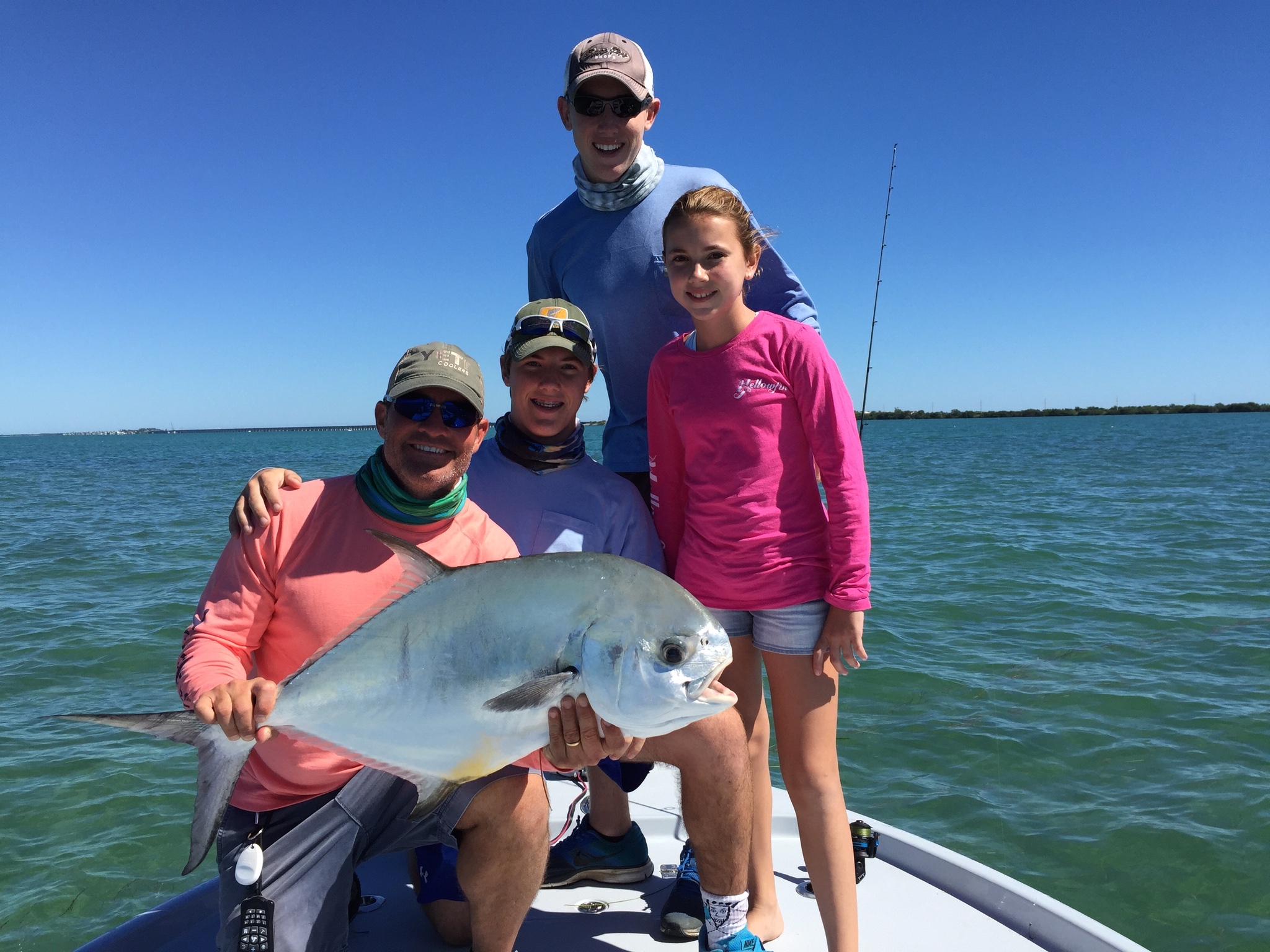 Hayden caught this BEAUTIFUL Permit and my BEAUTIFUL wife got a picture of me, Turner, Hayden and Hanna with it!