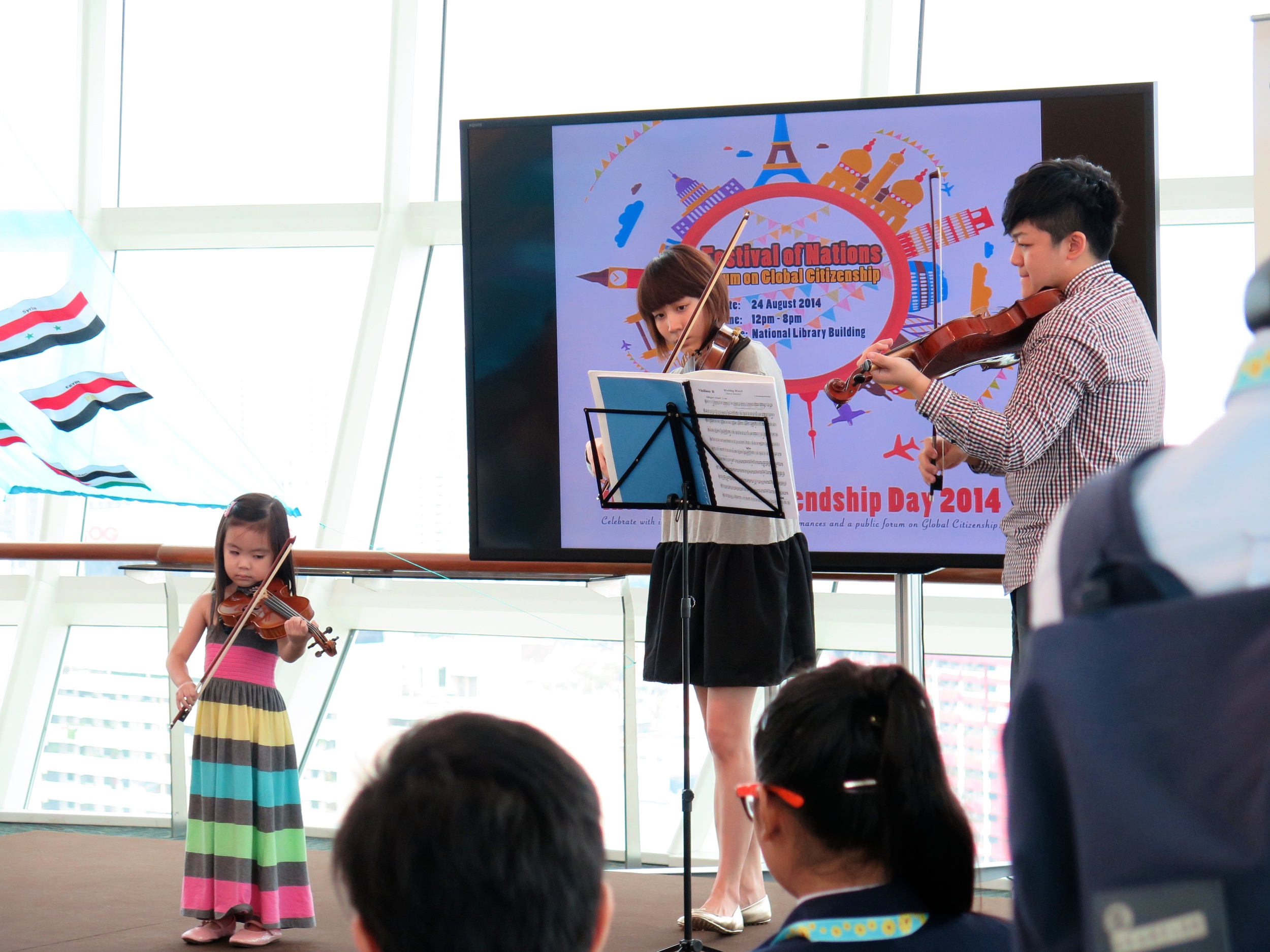 Young Ellie showing maturity way beyond her age as she is accompanied by teacher Tingxi and teacher Jeremiah