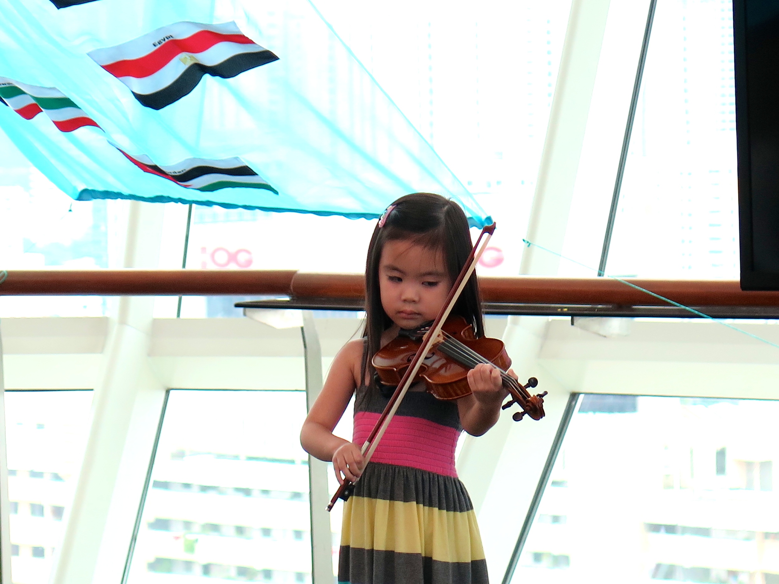 Ellie performing for the VIPs on the 16th floor