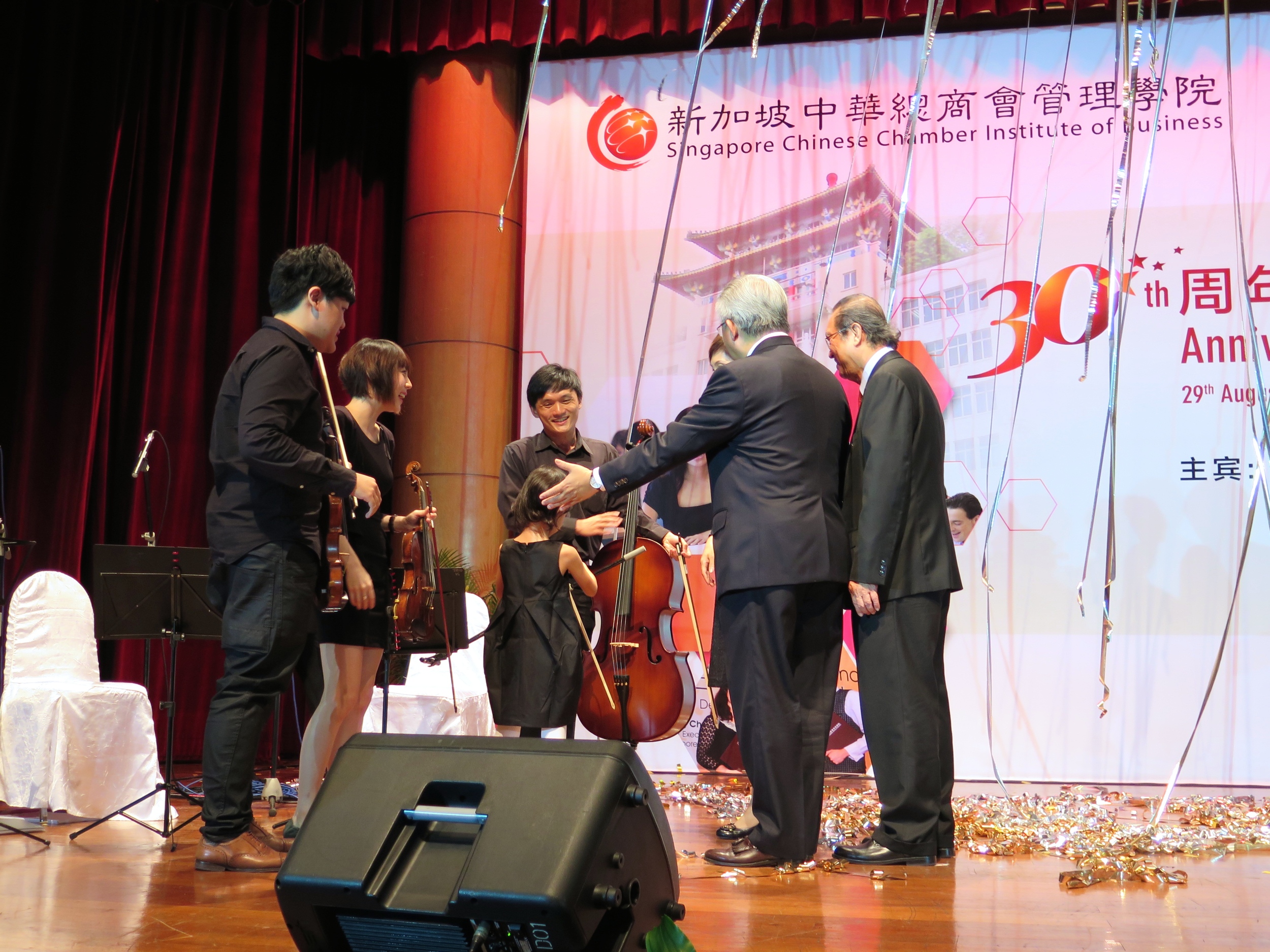 Young Faith Ow being showered with attention from all the VIPs following her wonderful solo performance