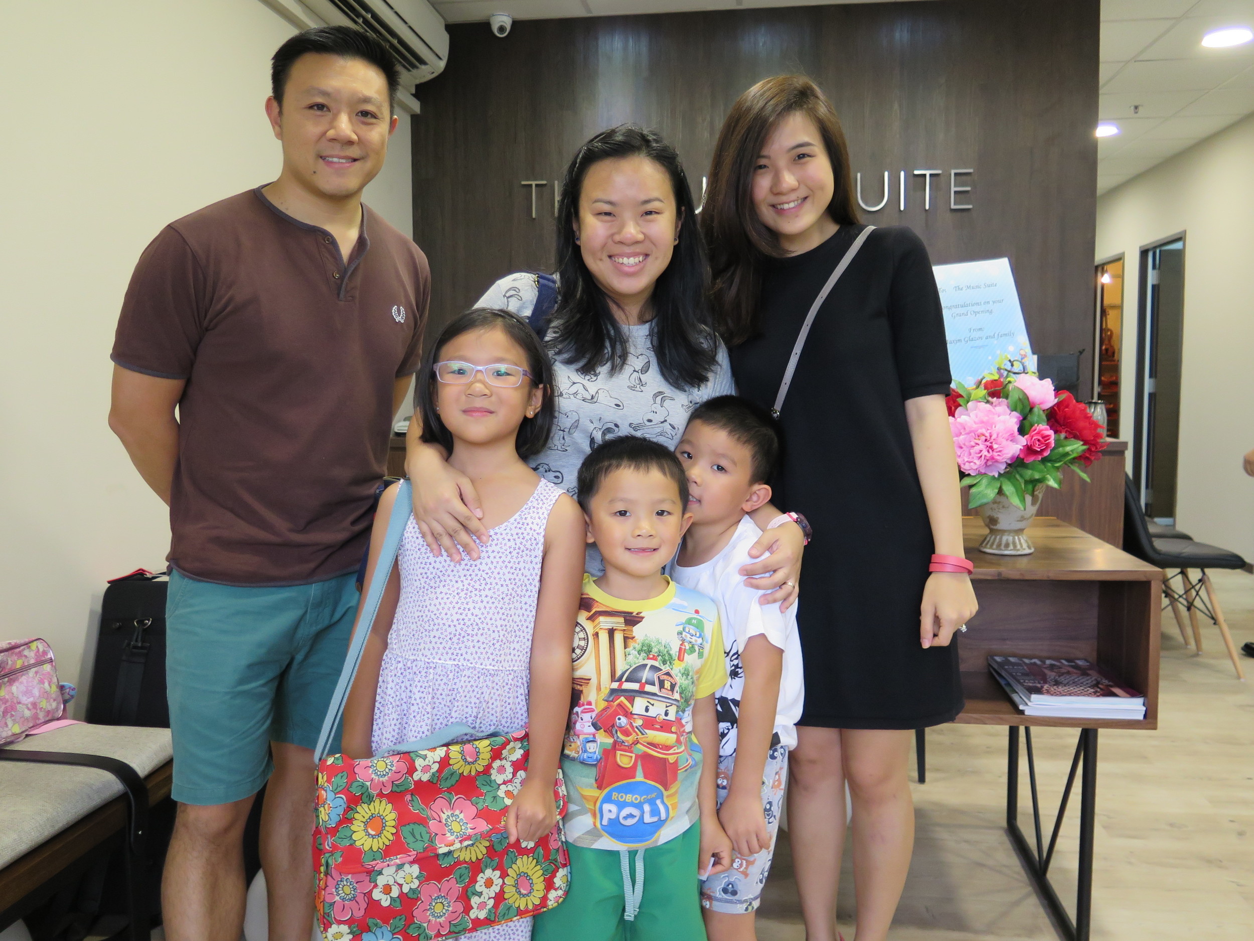 Teacher Sandy with her student Hannah and family