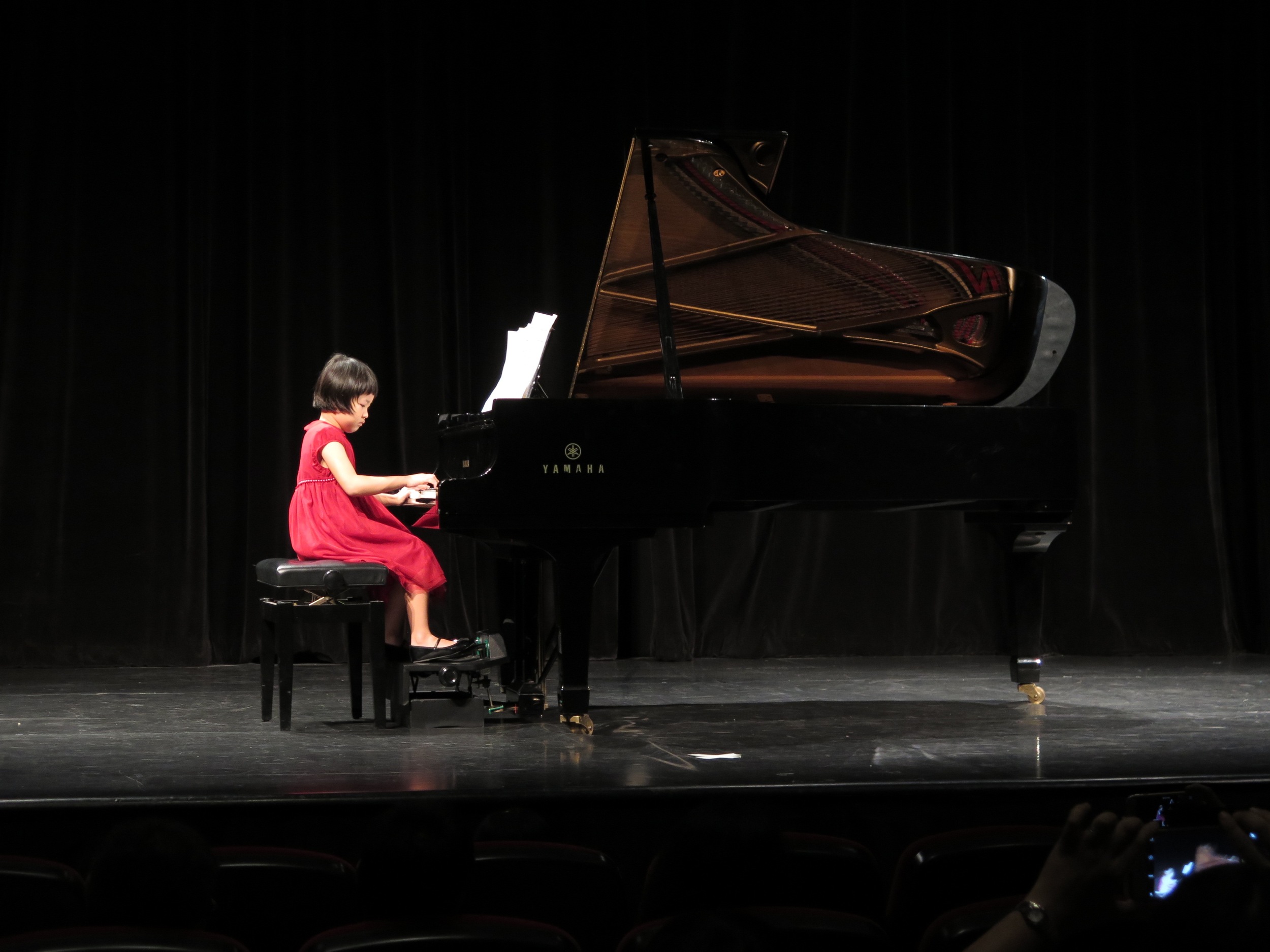 and Yun Hui on the piano and her piano pedal extender after her wonderful emceeing! 