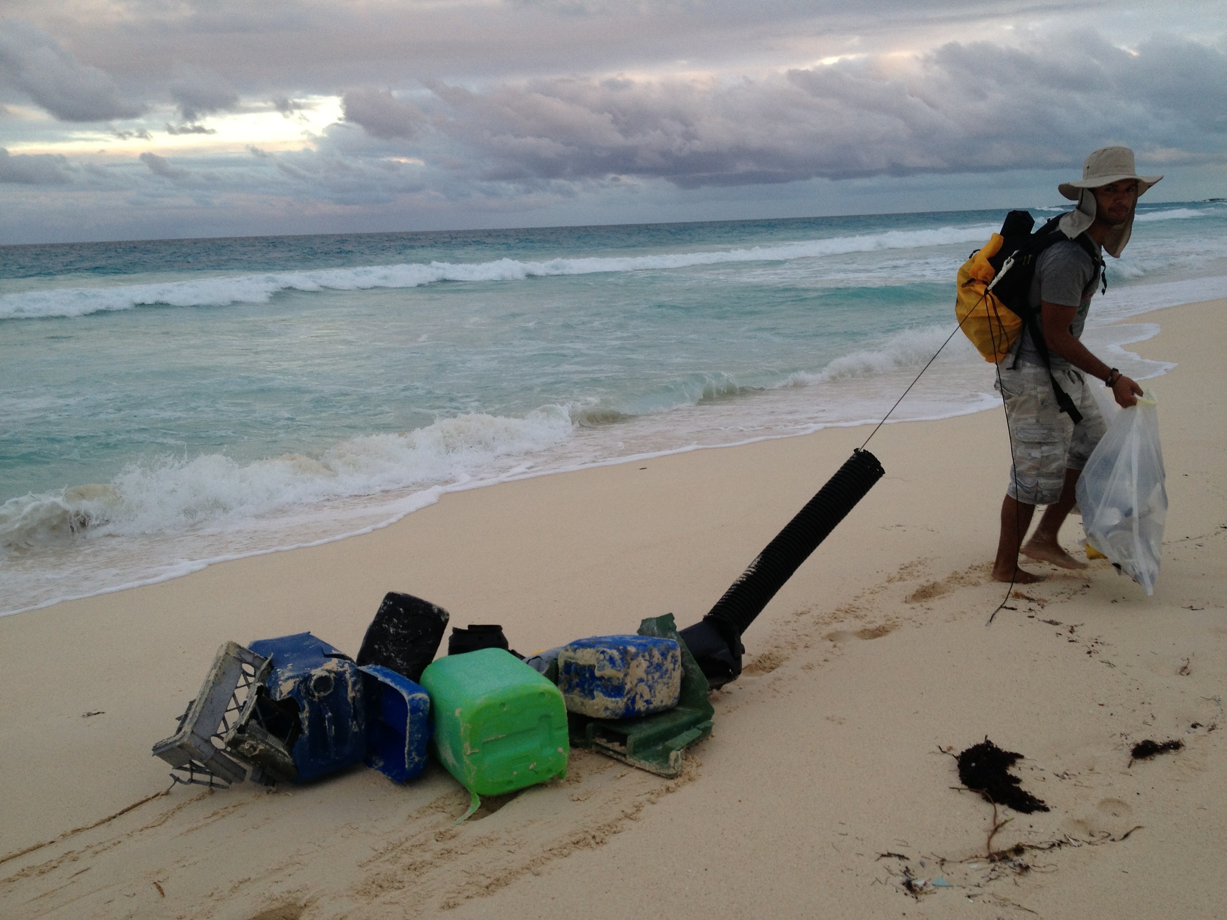 A picture of me trying to remove what I could from the beach. Photo by Rachel Glickhouse.