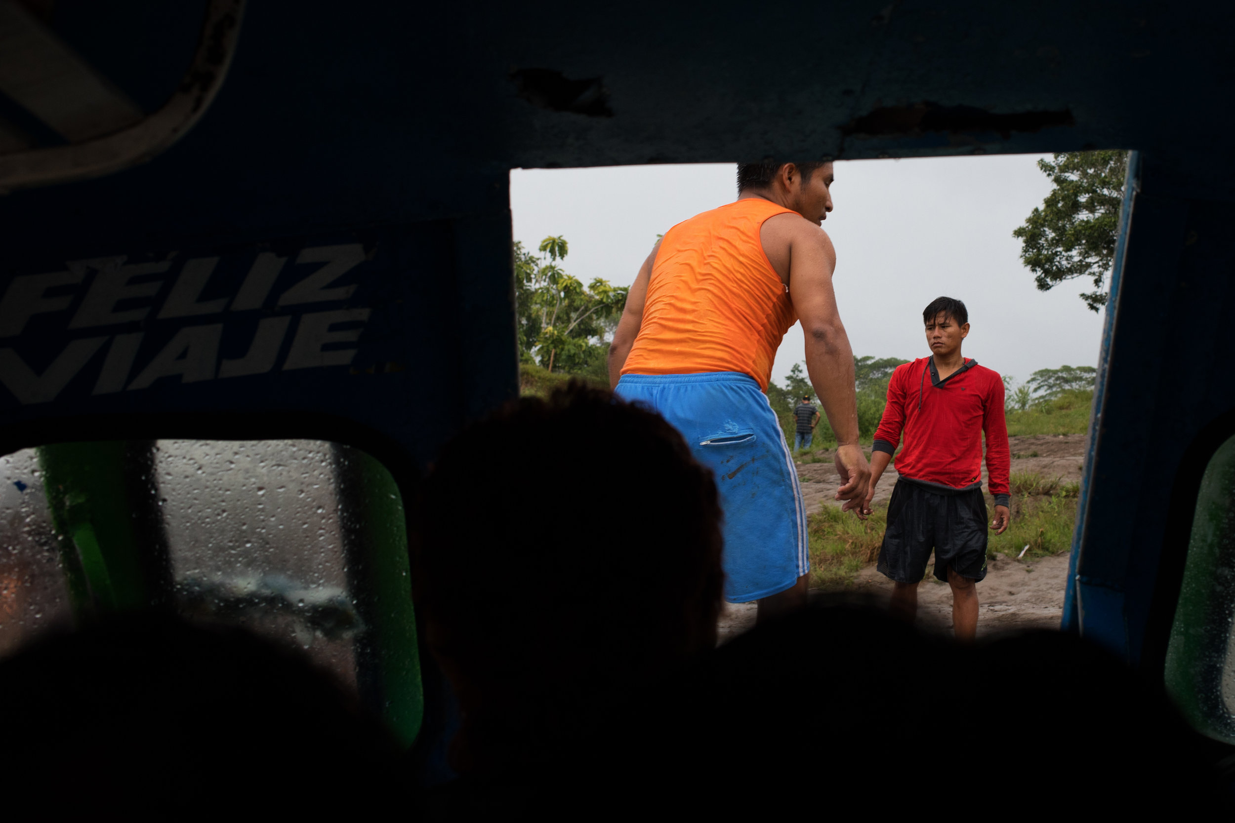 Men working on the dock in Iquitos, Peru