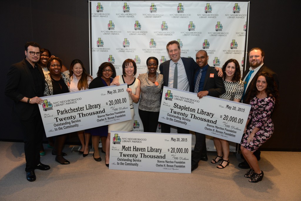 Parkchester, Stapleton, and Mott Haven Libraries accept their awards