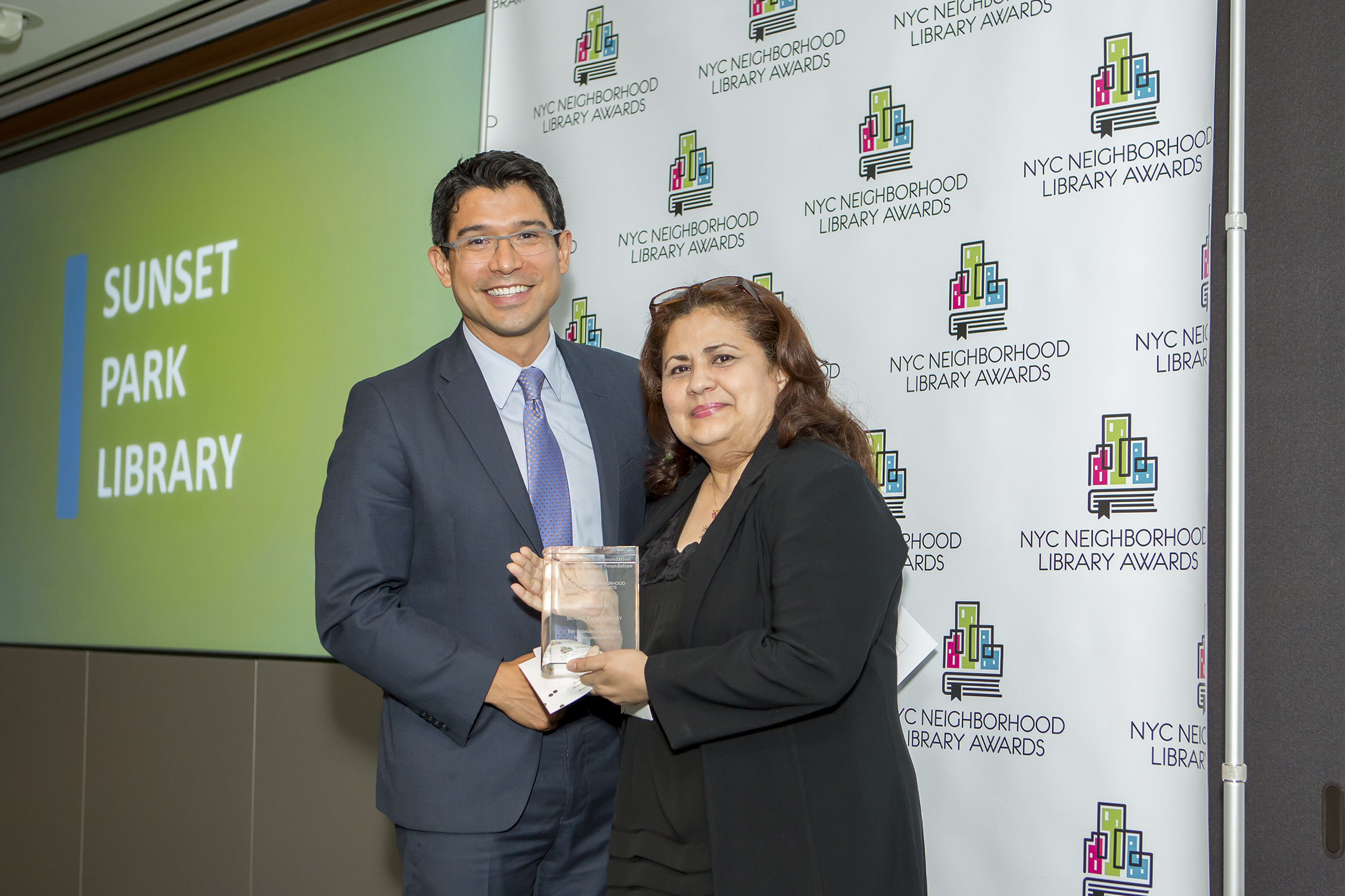 Council Member Carlos Menchaca and Roxana Benavides, Manager of the Sunset Park Library