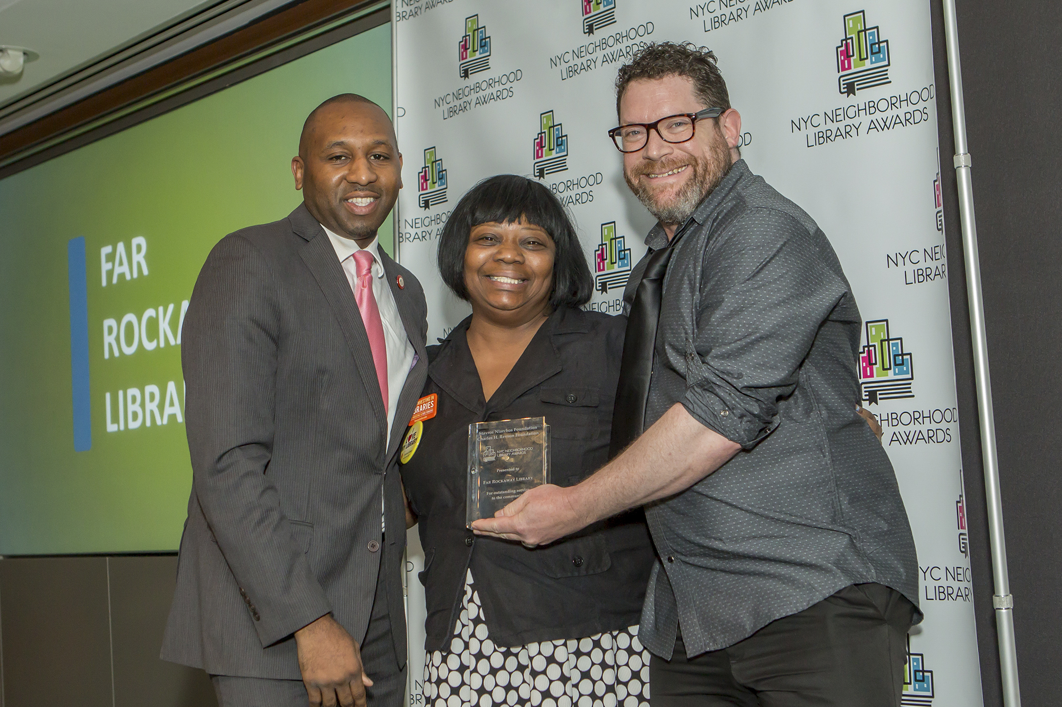 Council Member Donovan Richards and Cathy Cox & Michael Stamberg, staff members at the Far Rockaway Library