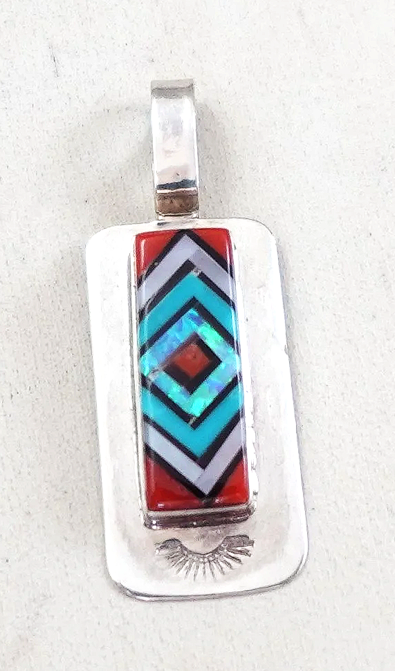 zuni-multi-stone-inlay-eye-dazzler-silver-pendant-vacit-1075F-.png