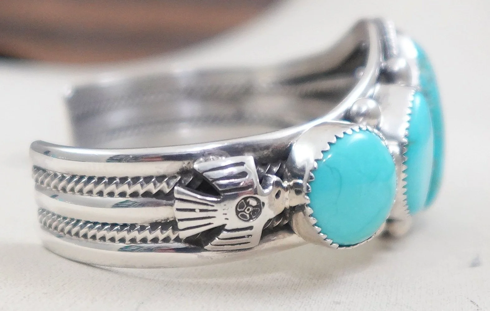 navajo-blue-gem-turquoise-sterling-silver-eagles-bracelet-jaque-1065M-1.jpg