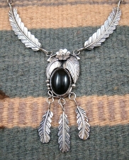 Item #757A- Navajo Onyx Decorated Flower - Feathers Necklace
