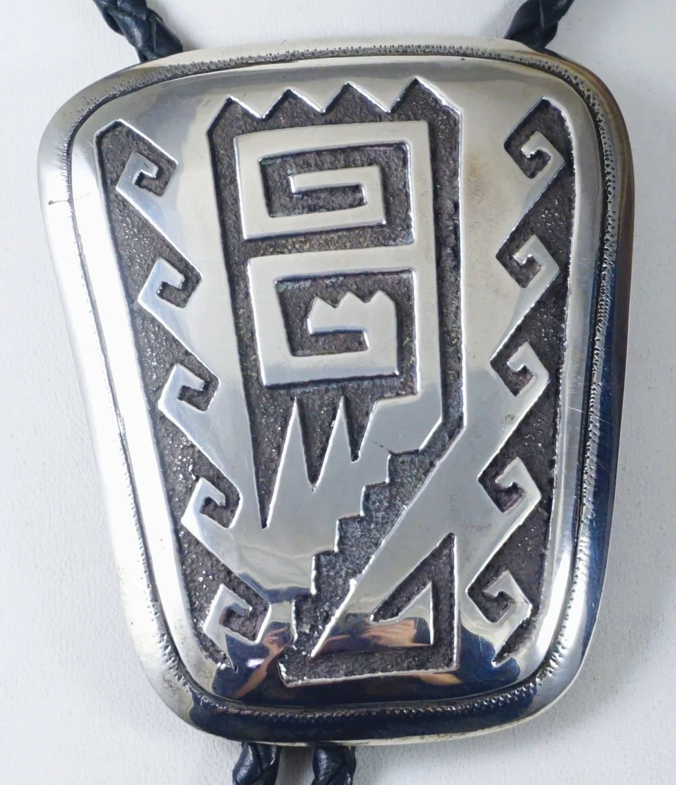 collectors-vintage-navajo-silver-overlay-symbols-bolo-tie-thomas-singer-885x-1.jpg