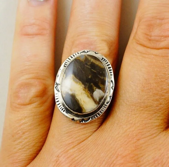 Item #949Z- Navajo Oval Fossilized Ivory Stamped Sterling