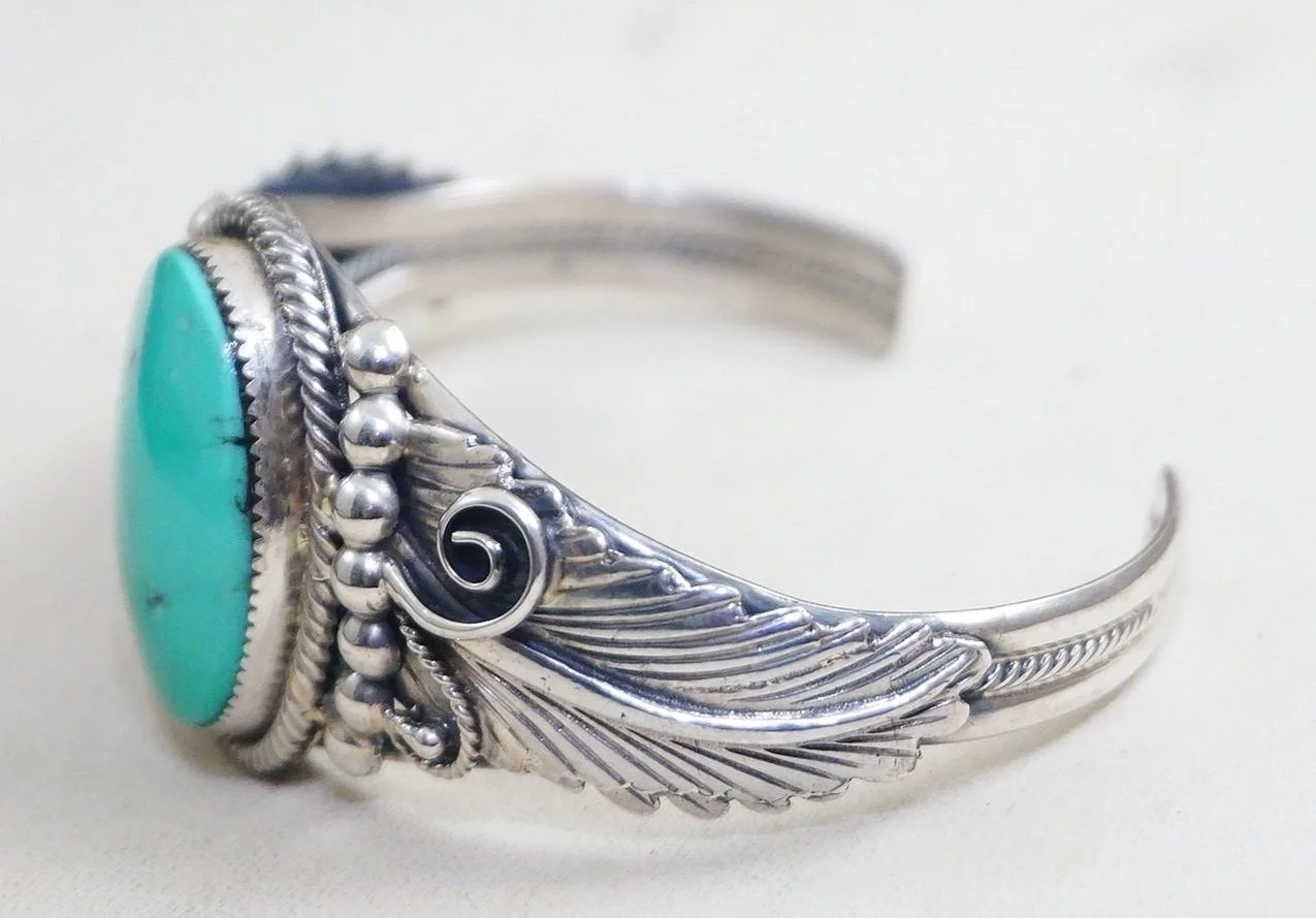 Item #1000B- Navajo Turquoise Double Feather Scrolls Sterling