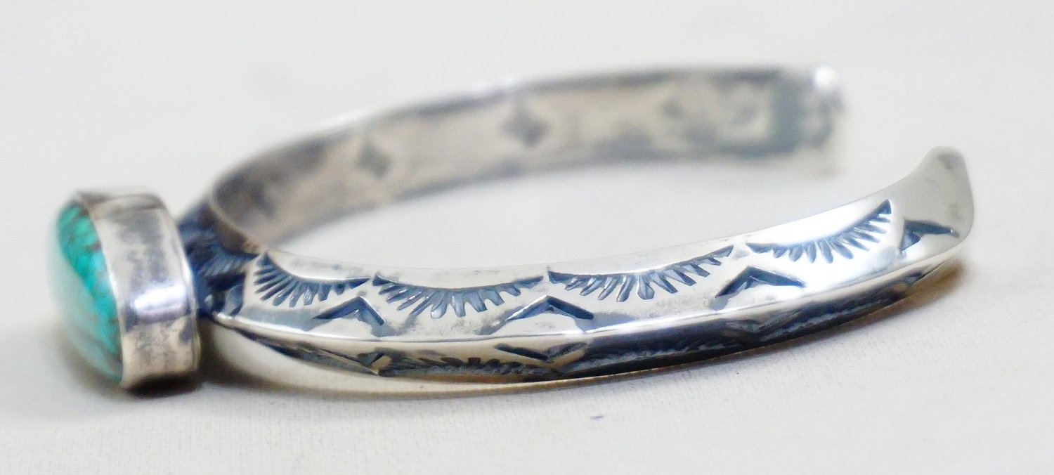 Item 1010H - Navajo Turquoise Sunrise Stamped Carinated Sterling 