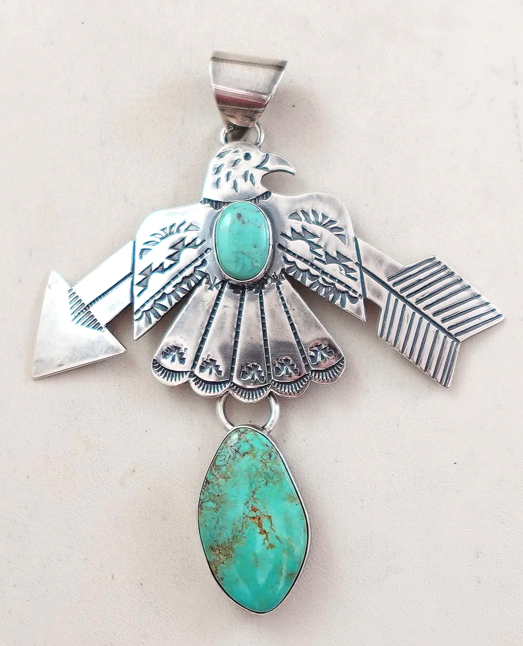navajo-turquoise-silver-eagle-arrow-pendant-teller-1077M-.png
