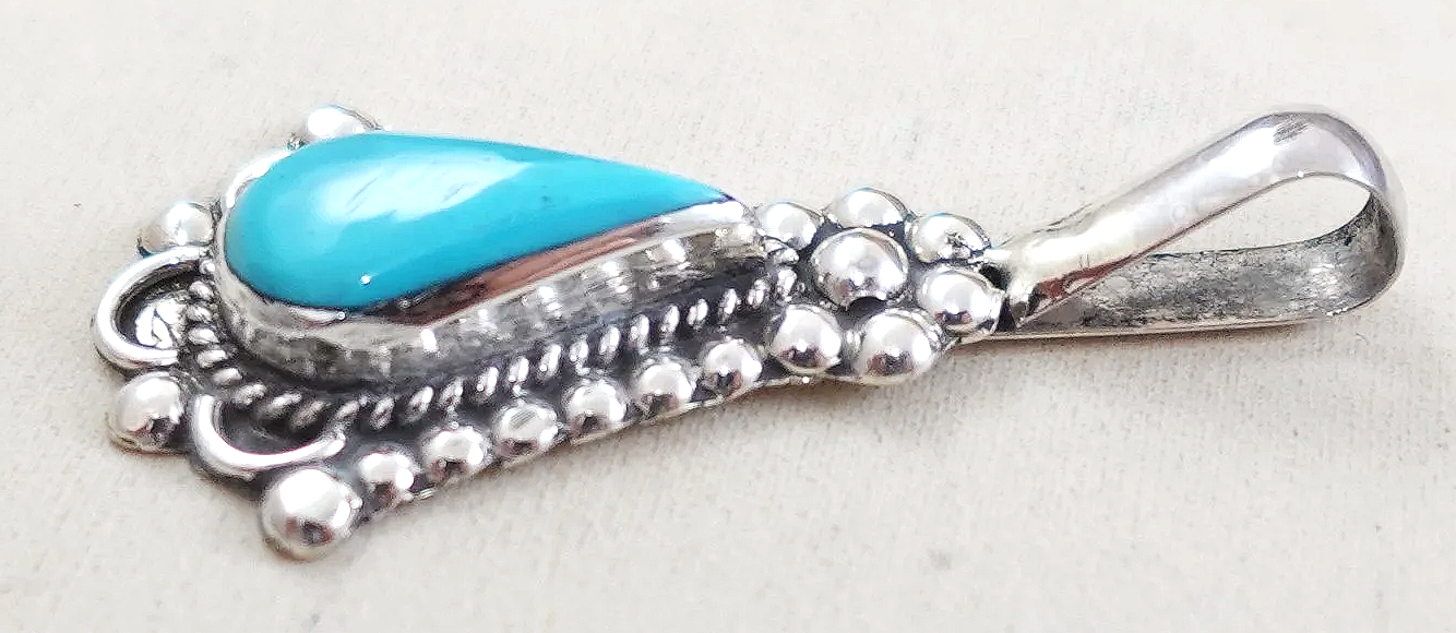 zuni-turquoise-sterling-silver-teardrop-pendant-yatsattie-1073P-1.png