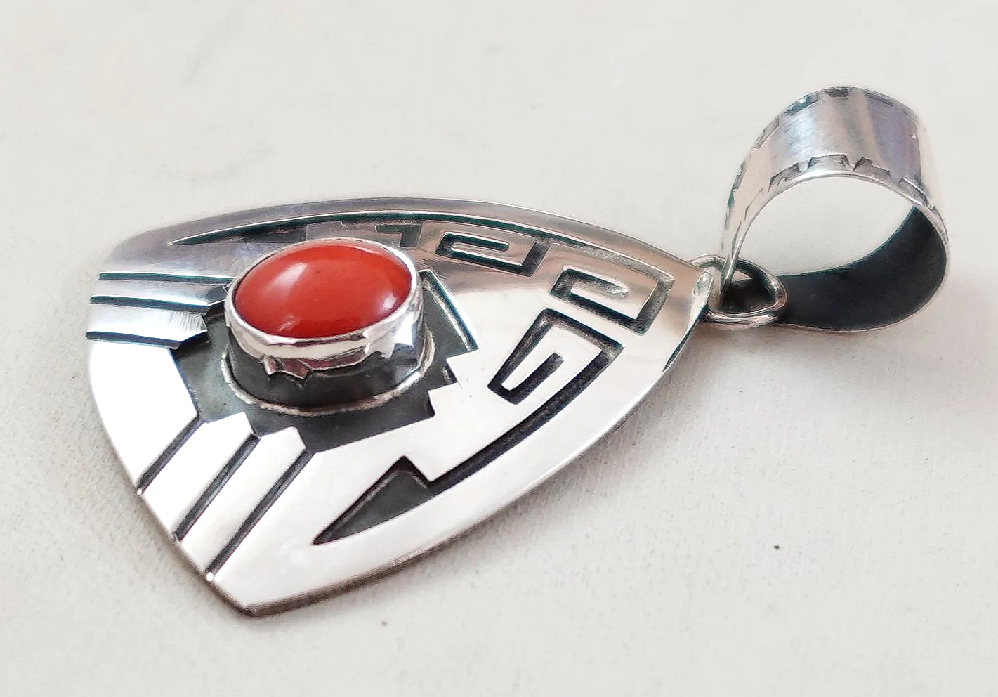 navajo-coral-silver-symbol-overlay-spearhead-pendant-teller-1077E-1.png