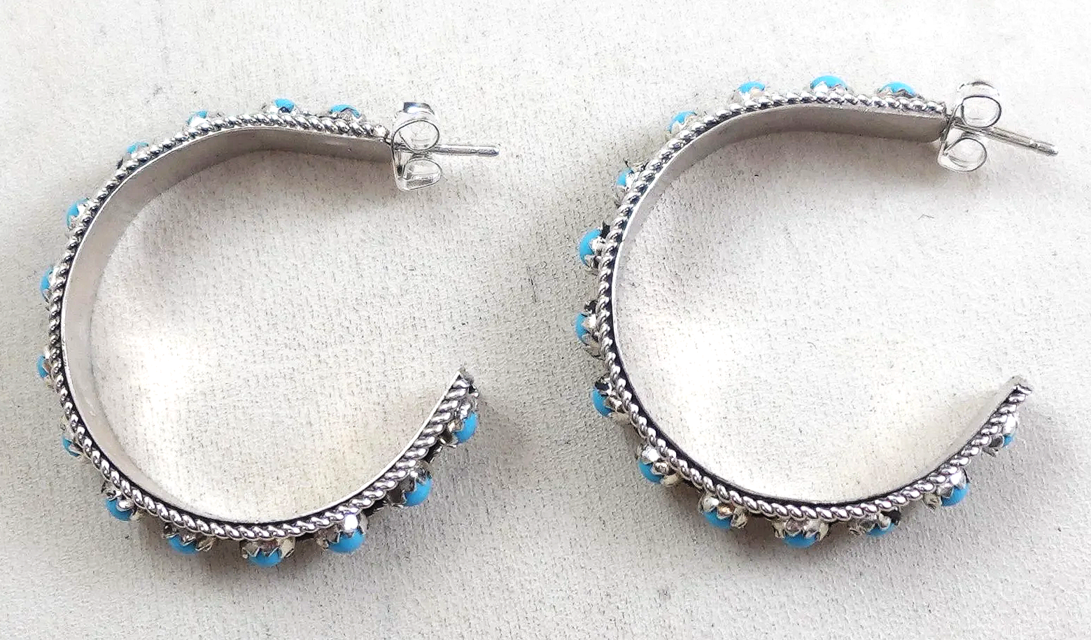 zuni-turquoise-snake-eyes-silver-half-hoop-earrings-charley-1073K-2.png