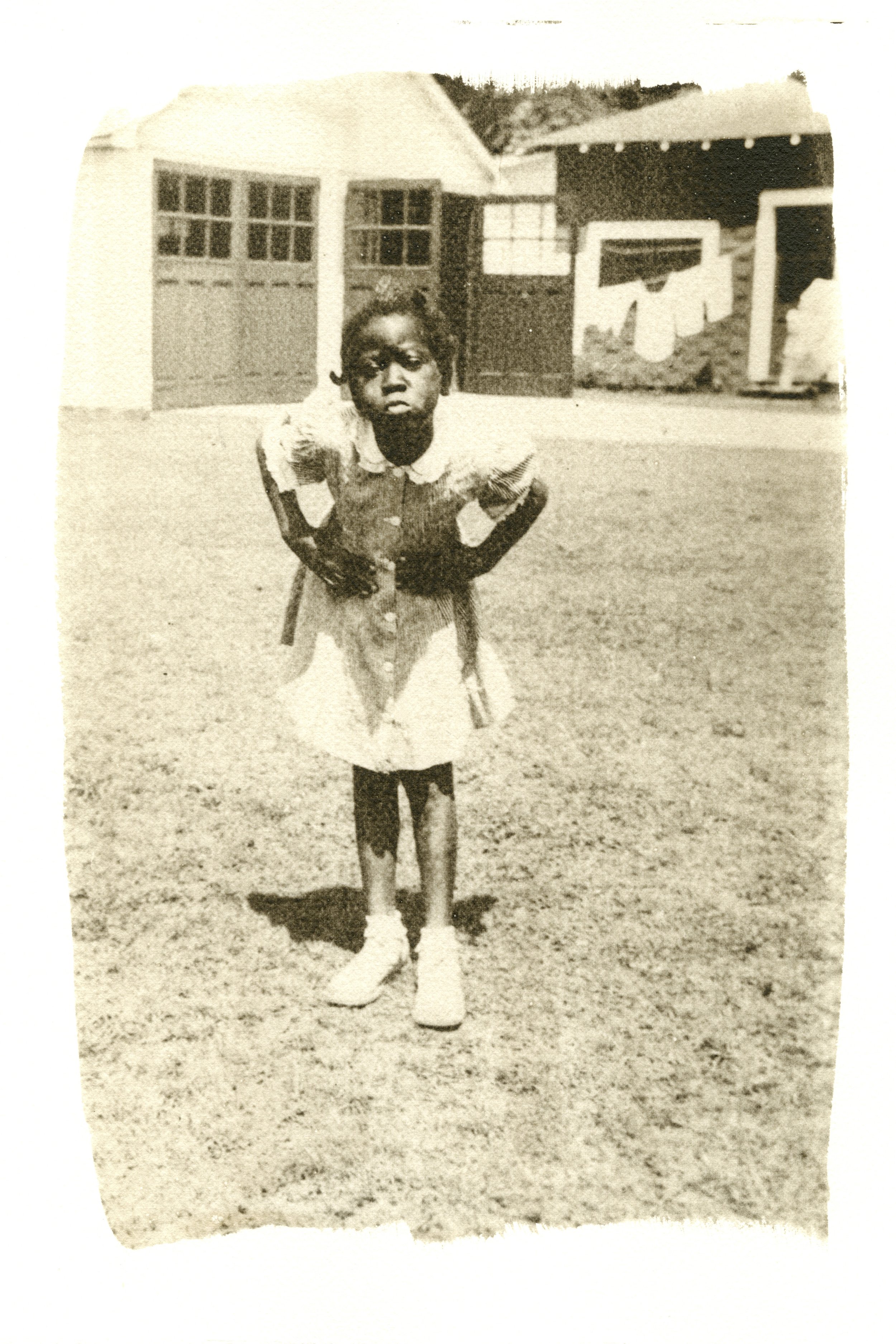 Girl in Yard, Selma, Alabama, 1950's