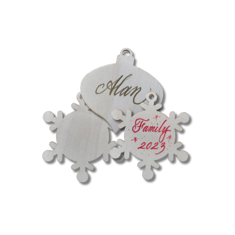 Round and snowflake wooden ornaments personalized with calligraphy