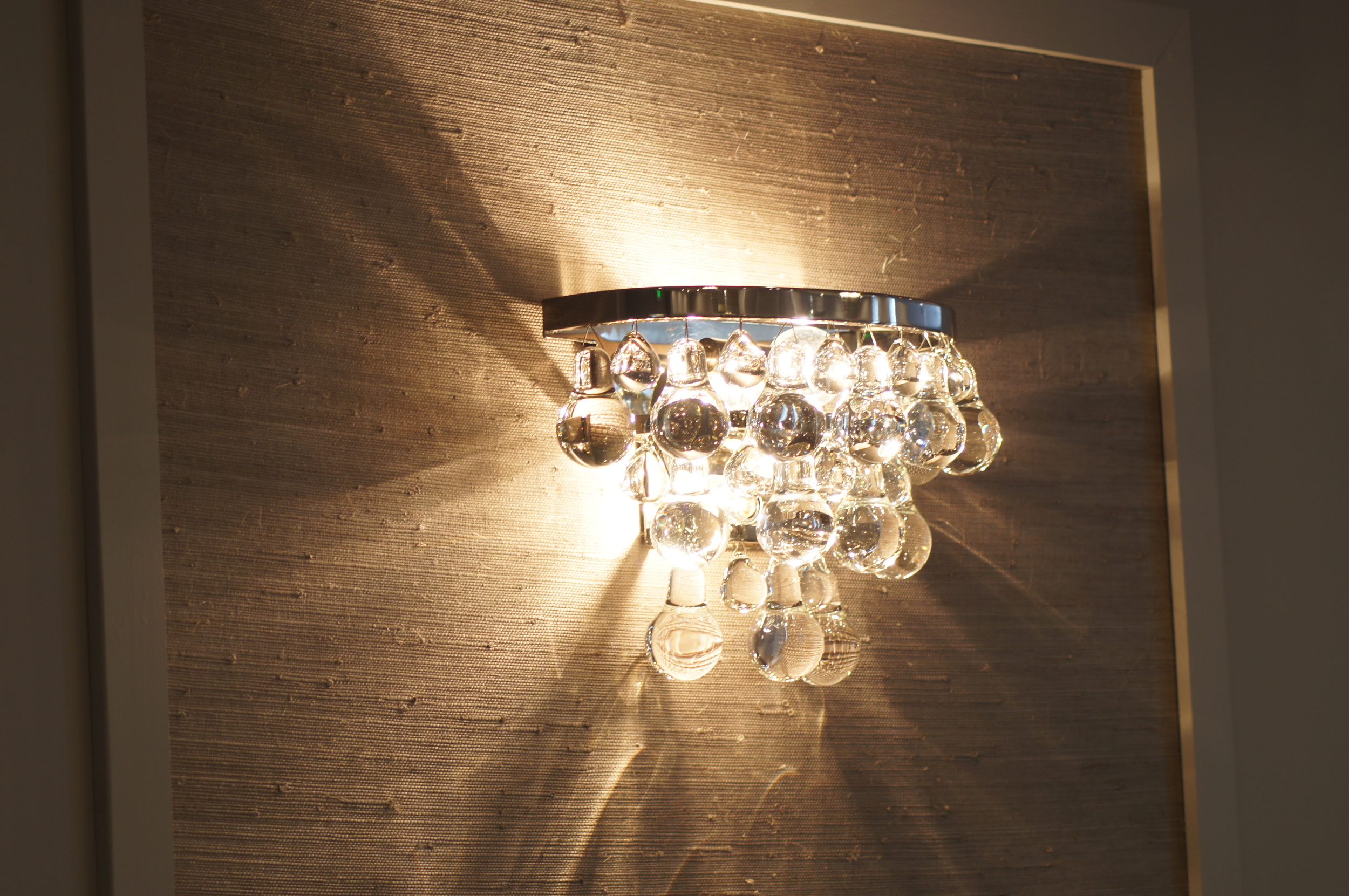 GLASS BULB ACCENTED LIGHTING IS USED THROUGHOUT THE BUILDING