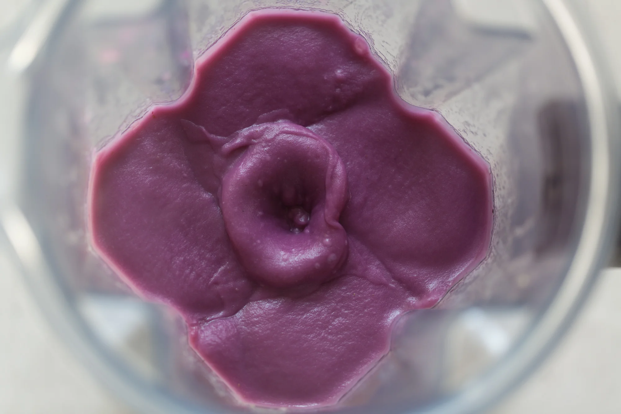 Blend the purple sweet potatoes and vegetable broth until it's a luscious puree. 