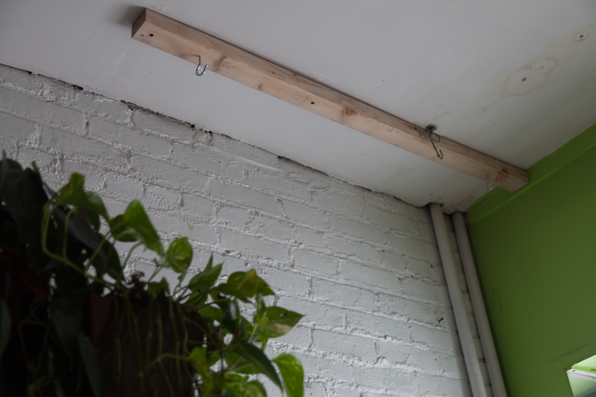 The ceiling in my home is quite irregular, so my father added a reinforcement wood to the ceiling.