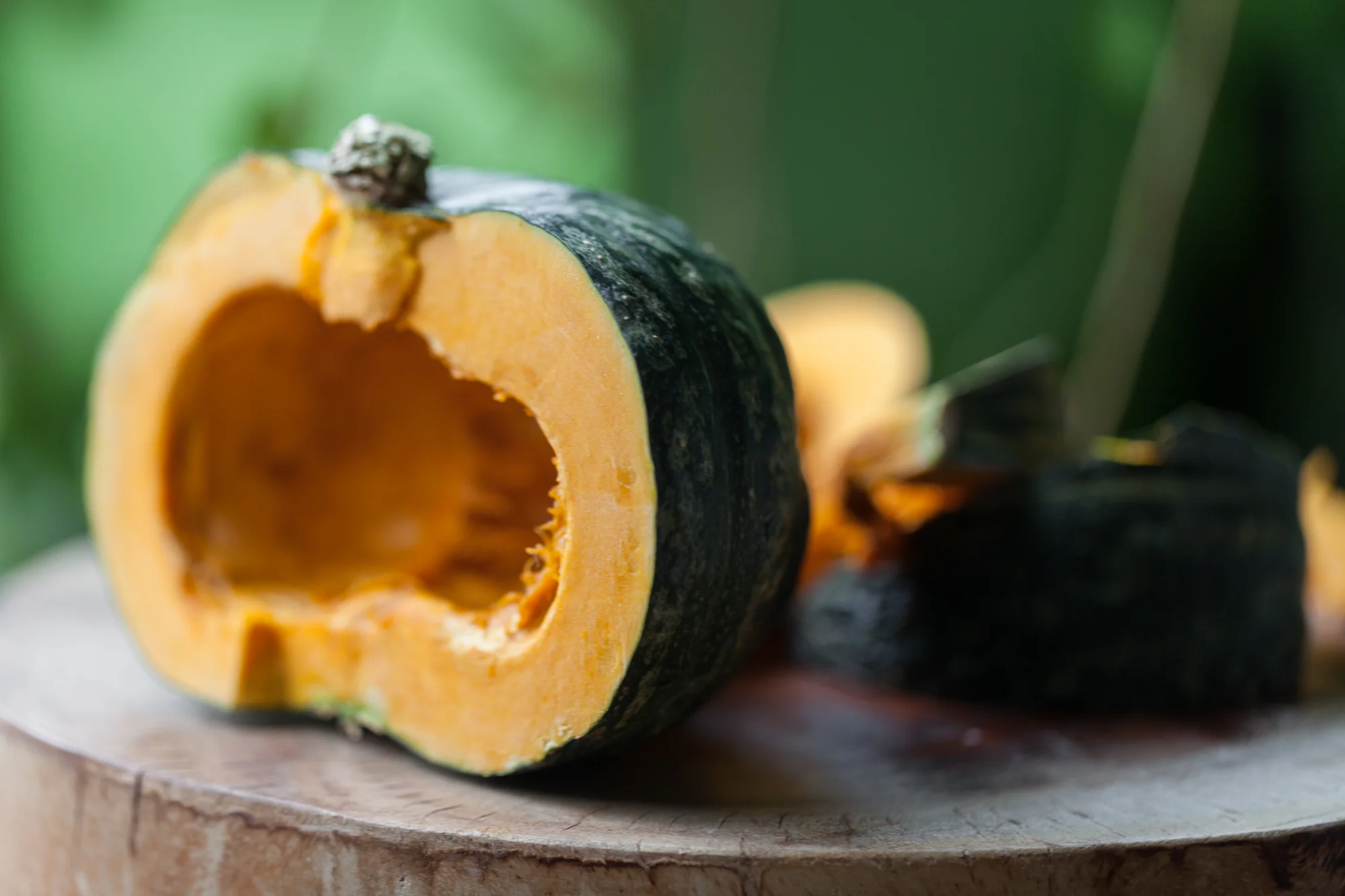 Kabocha squash or Japanese pumpkin ( Cucurbita maxima ) is a winter squash variety that has started to become quite popular in farmers markets and some supermarket chains. Though the skin, which is thick and knobby, doesn't look remotely edible, it actually is and provides a significant amount of fiber. The inside flesh is sweet—a sort of cross between a pumpkin and sweet potato. You can let a kabocha get quite large, which makes it look intimidating, but once you get a knife through it, it's easy to prepare! 