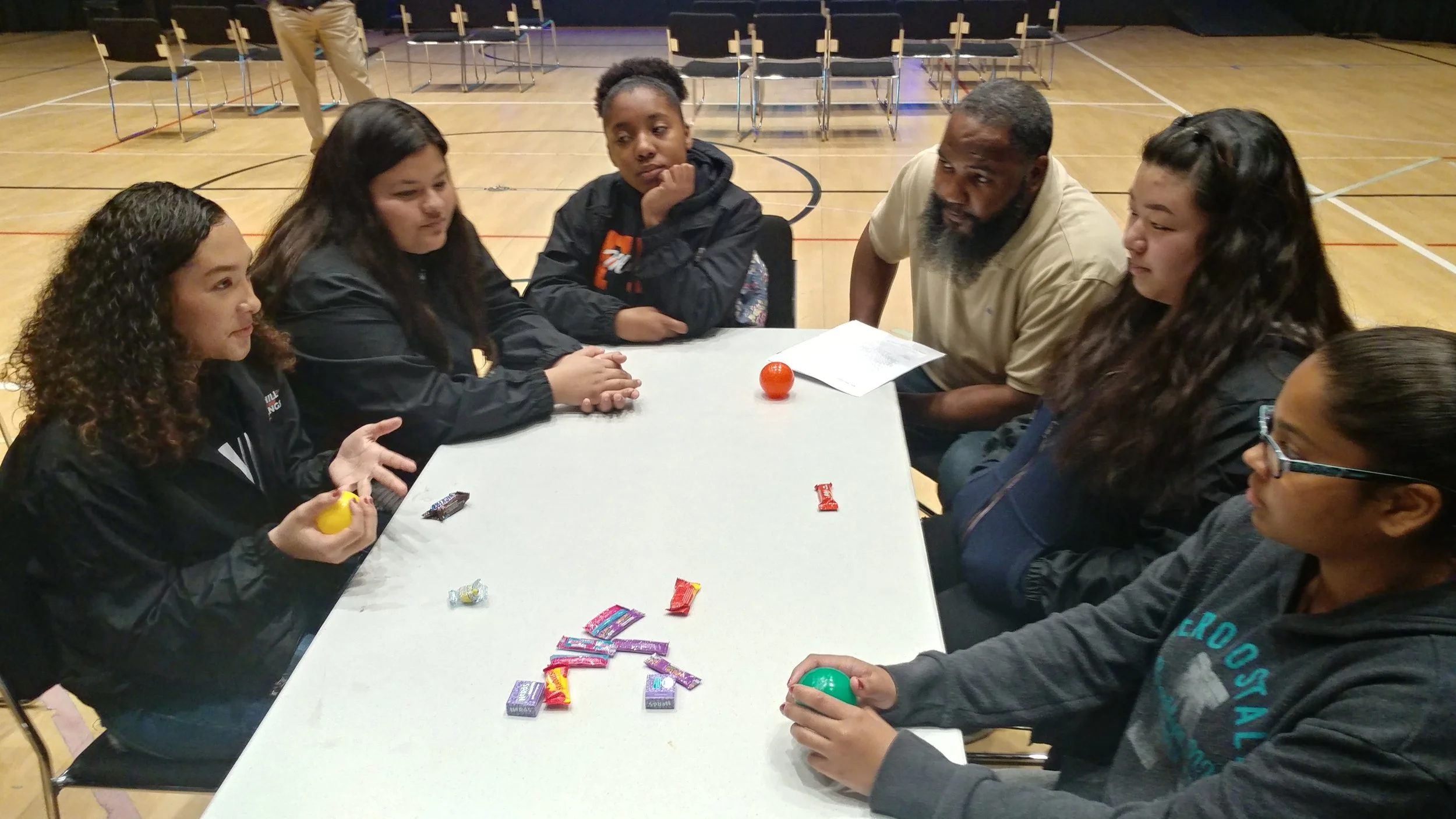 Collaborative Partner Ryan from SacACT (Sacramento Area Churches Together) facilitating a group discussion aimed at reducing violence in the neighborhood.