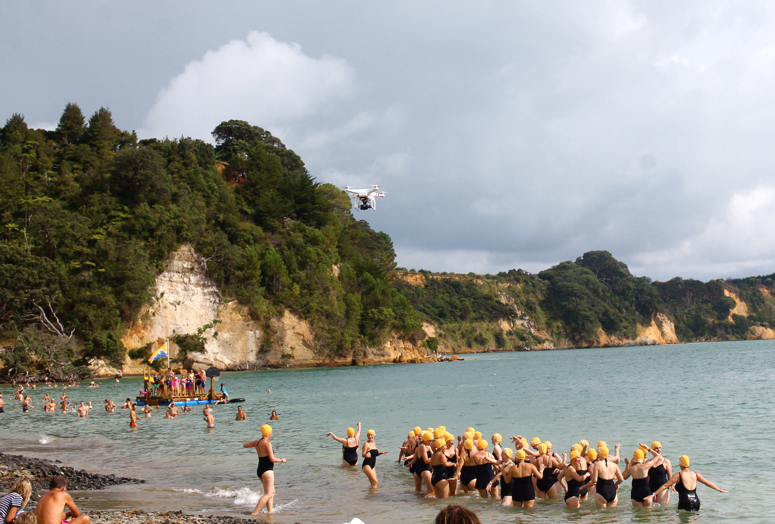 Note the Drone flying above the synchronized swimmers (!)