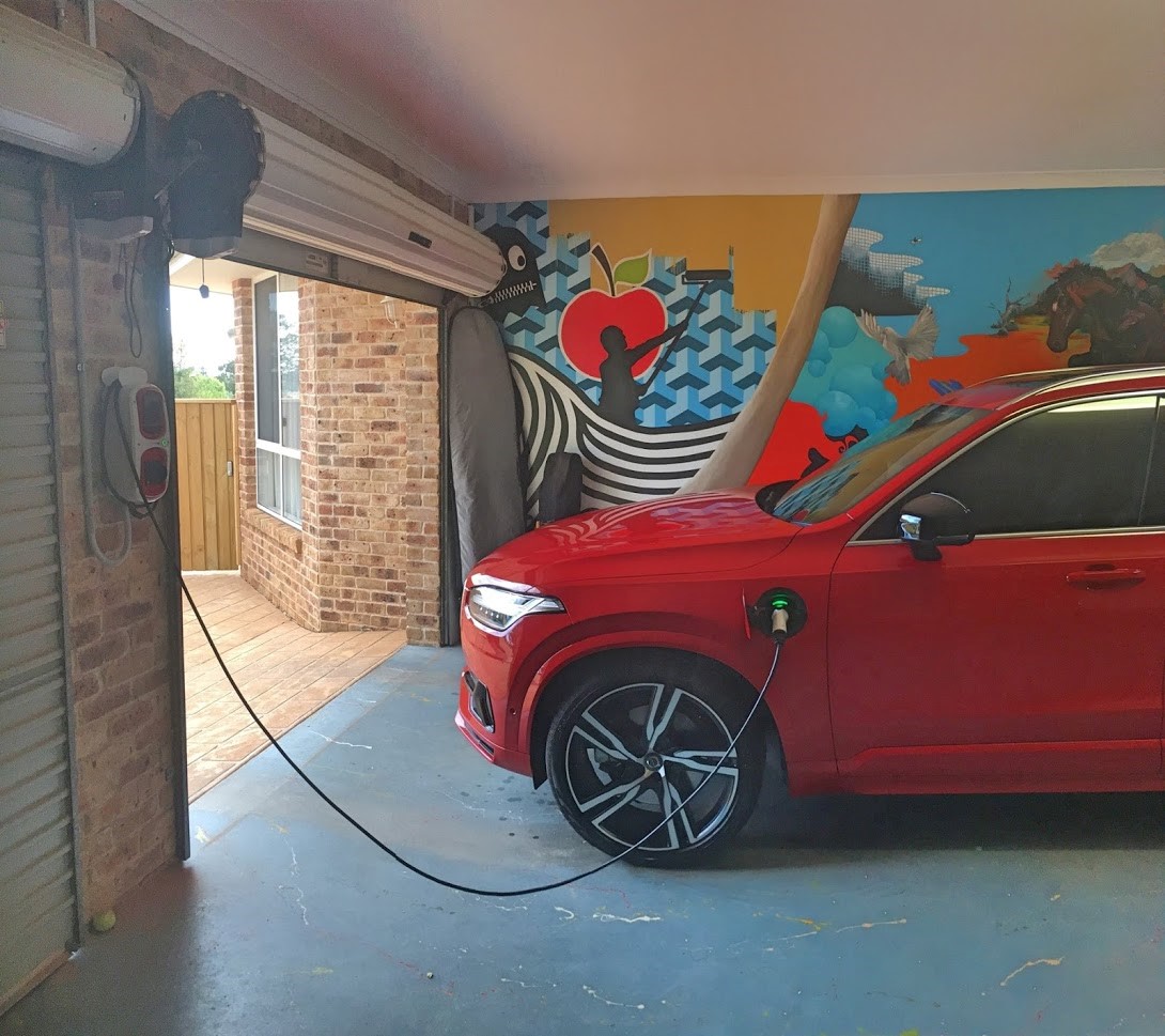 A Volvo XC90 T8 charging from the Wallpod