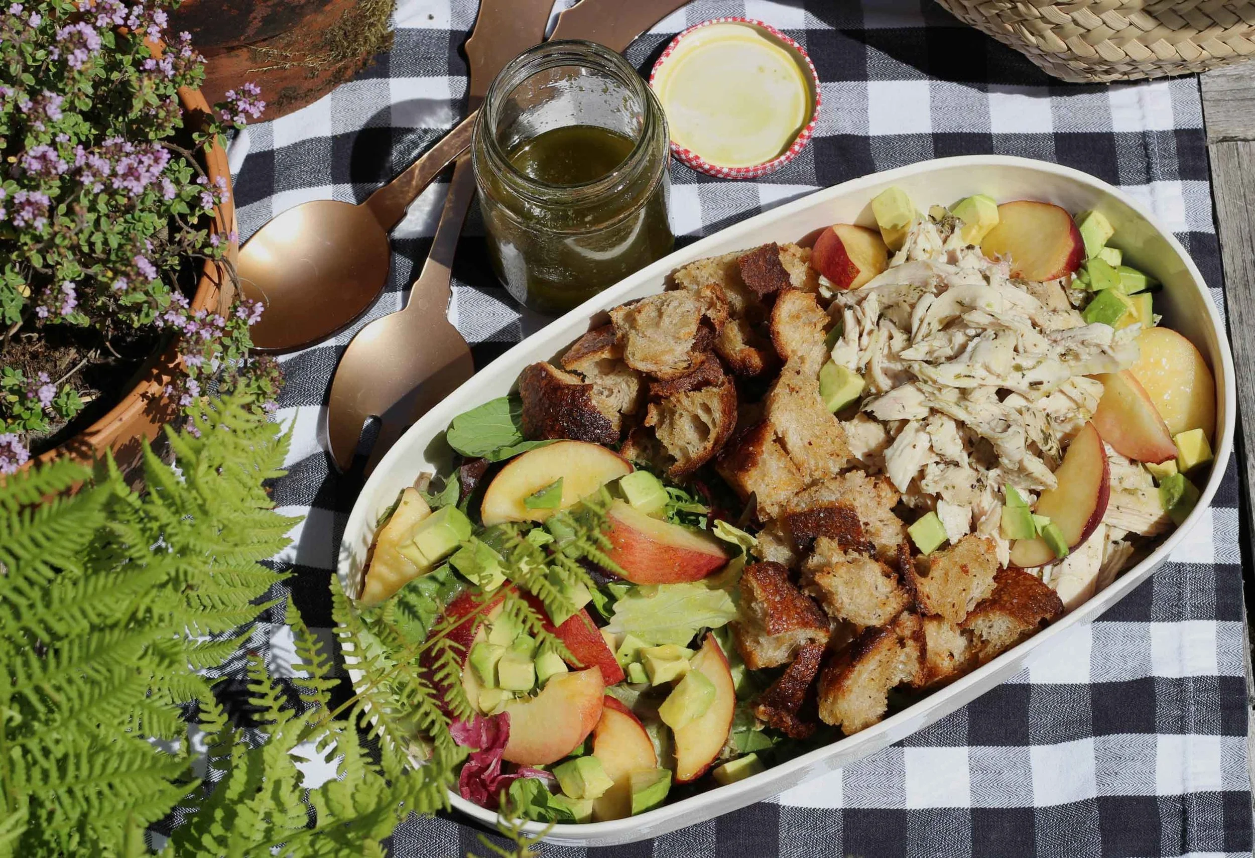 top-view-of-chicken-peach-avocado-salad-on-table.jpg