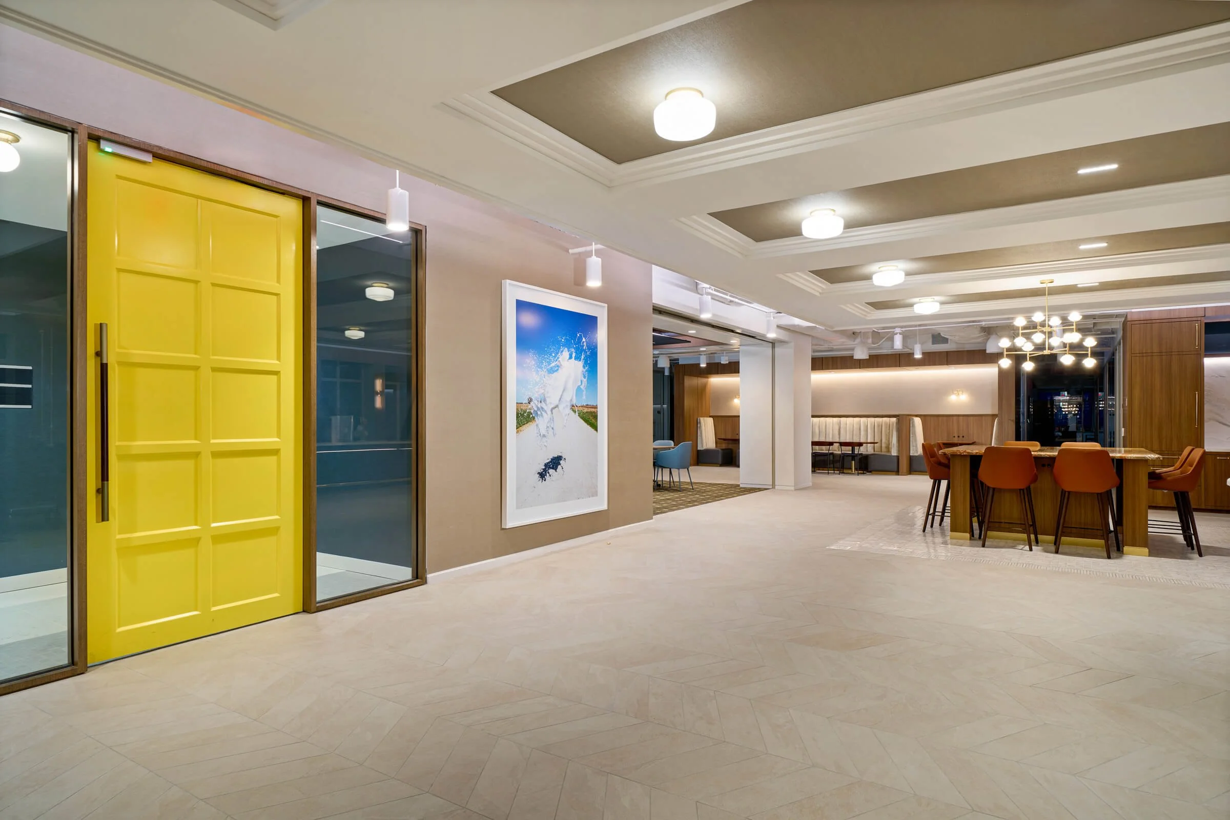 Modern corporate office interior completed by Coakley & Williams Construction featuring collaborative workspace and custom architectural finishes.