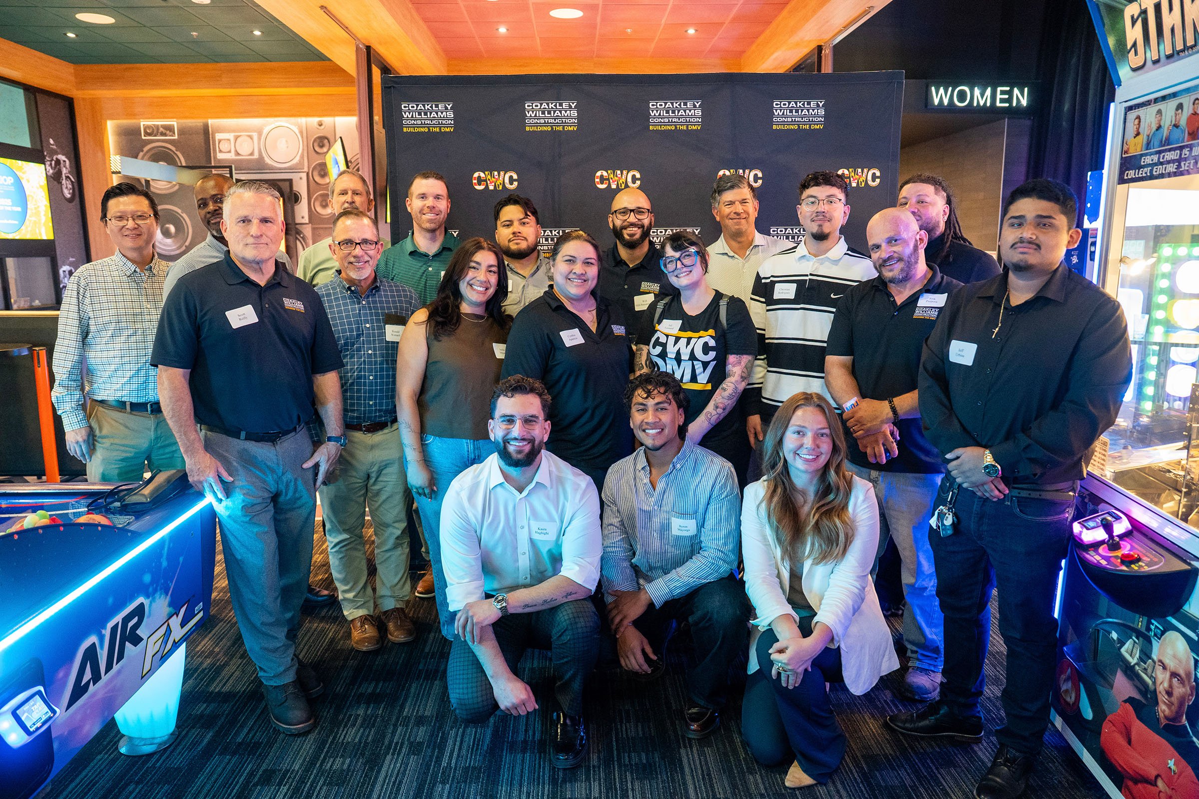 Coakley & Williams Construction Interiors team celebrating the firm’s Washington Business Journal Top 10 Interior Construction ranking.