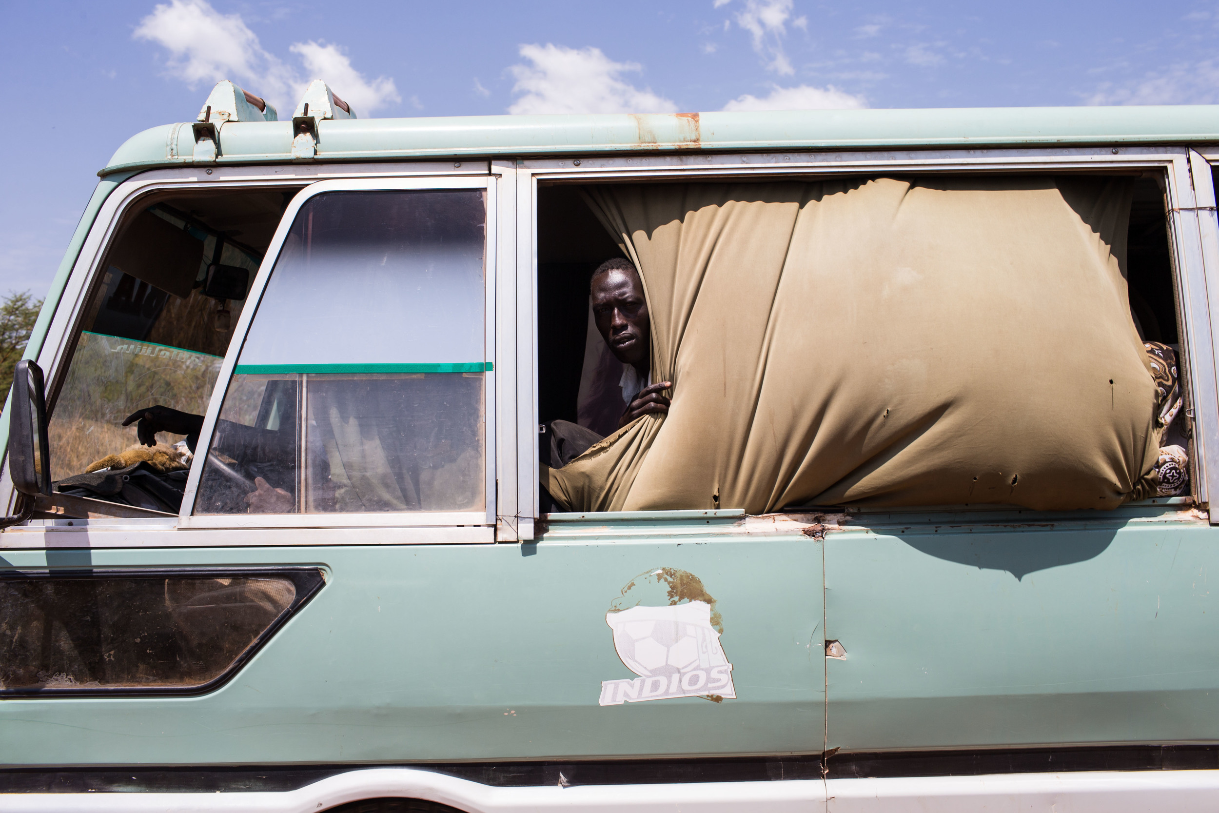 People travel from Agok, South Sudan to Abyei by bus. 64,775 people registered to vote in Abyei's referendum, many of whom were displaced by previous fighting but returned to Abyei to vote. 