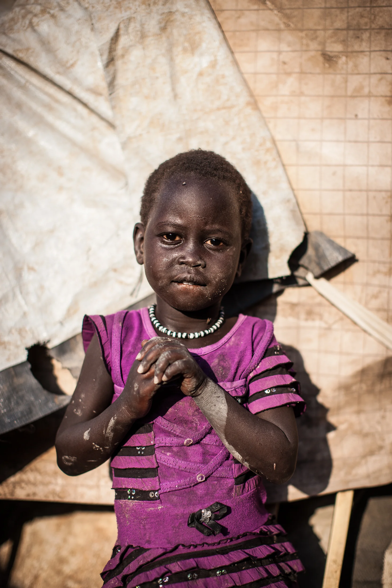 Delilah, 4, was displaced from Malakal town by fighting last year. She and her family now live in the United Nations (UN) Protection of Civilians (PoC) site at the Malakal UN base.
