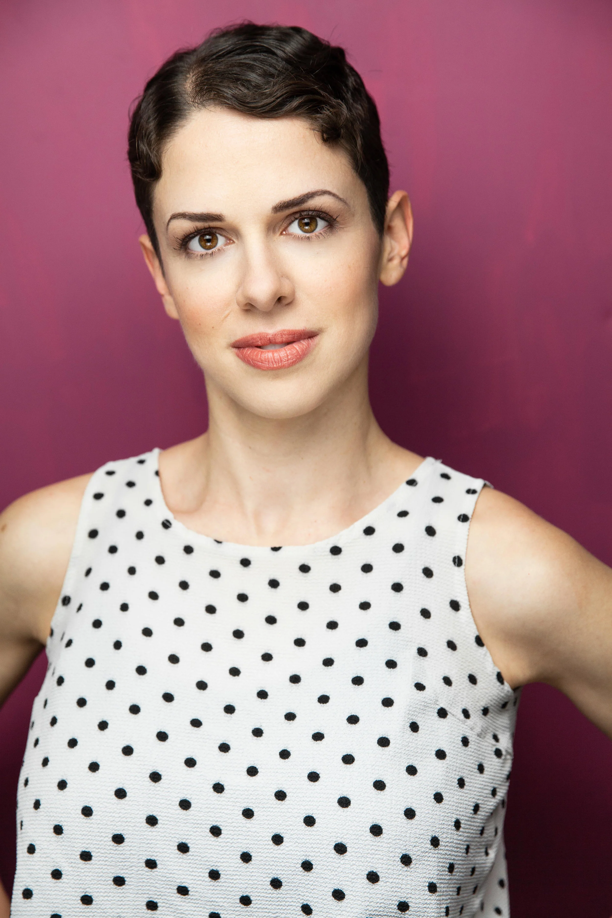 Kinneret Ely polka dot headshot.jpg