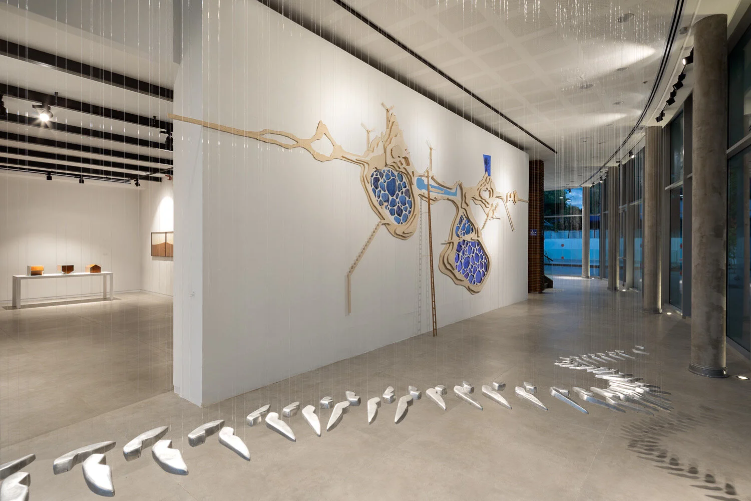 Tractor Traces, Aluminum casts and wire. 4 m long - exhibition view Greenville, 2020-21, at The New Municipal Gallery for Contemporary Art, Ramat Hasharon