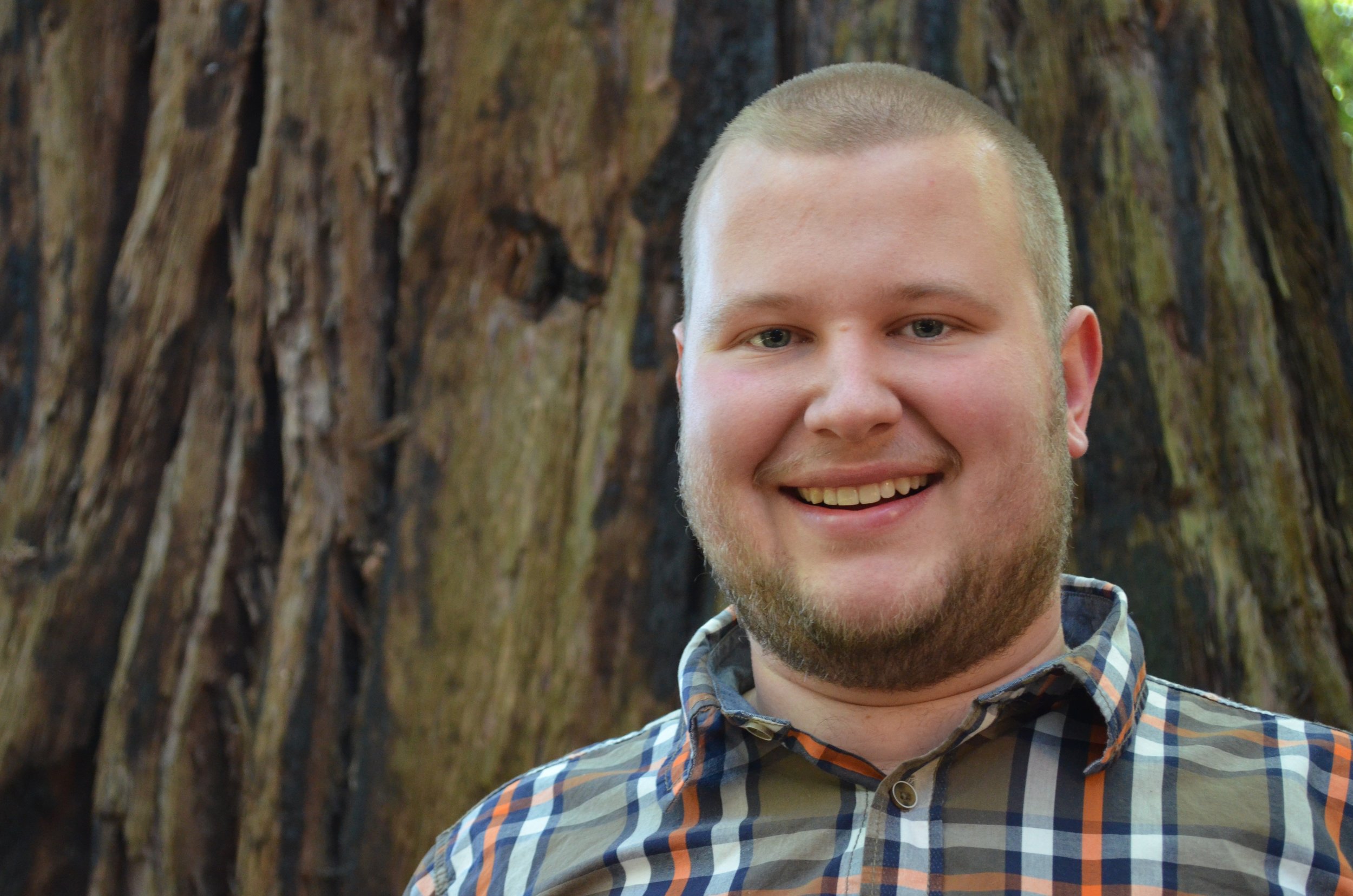 Zane Moore is a Plant Biology Ph.D. student at U.C. Davis studying mutations in plant cells. He received his B.S. in Botany from Colorado State University. Zane is a California State Parks docent and researcher at Big Basin Redwoods State Park, where he discovered the tallest redwood on earth south of San Francisco (the location is a secret). Photo by Audrey Moore
