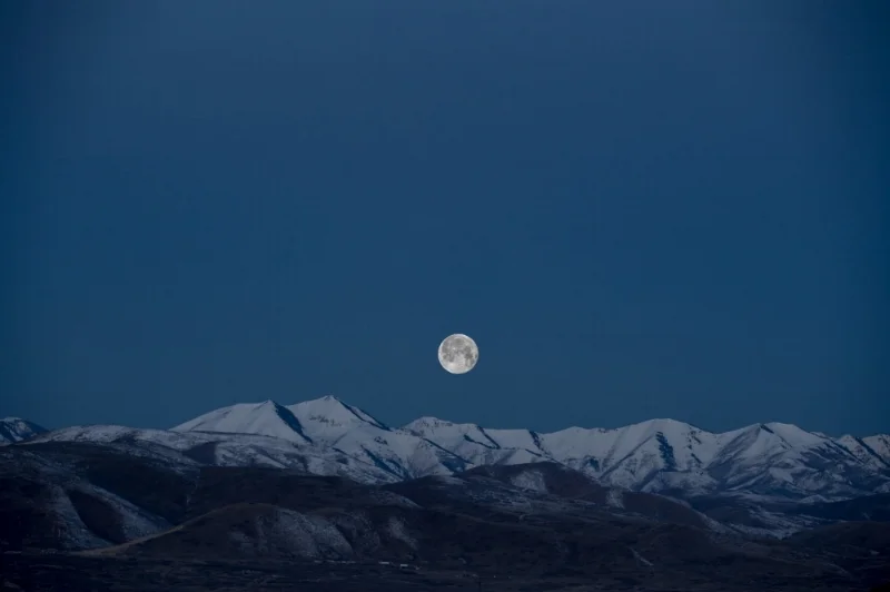 benjamin-child-full moon over mountains.jpg