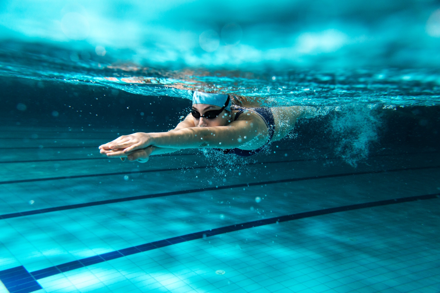 Female-swimmer-at-the-swimming-pool.-465383082_4700x3133.jpeg