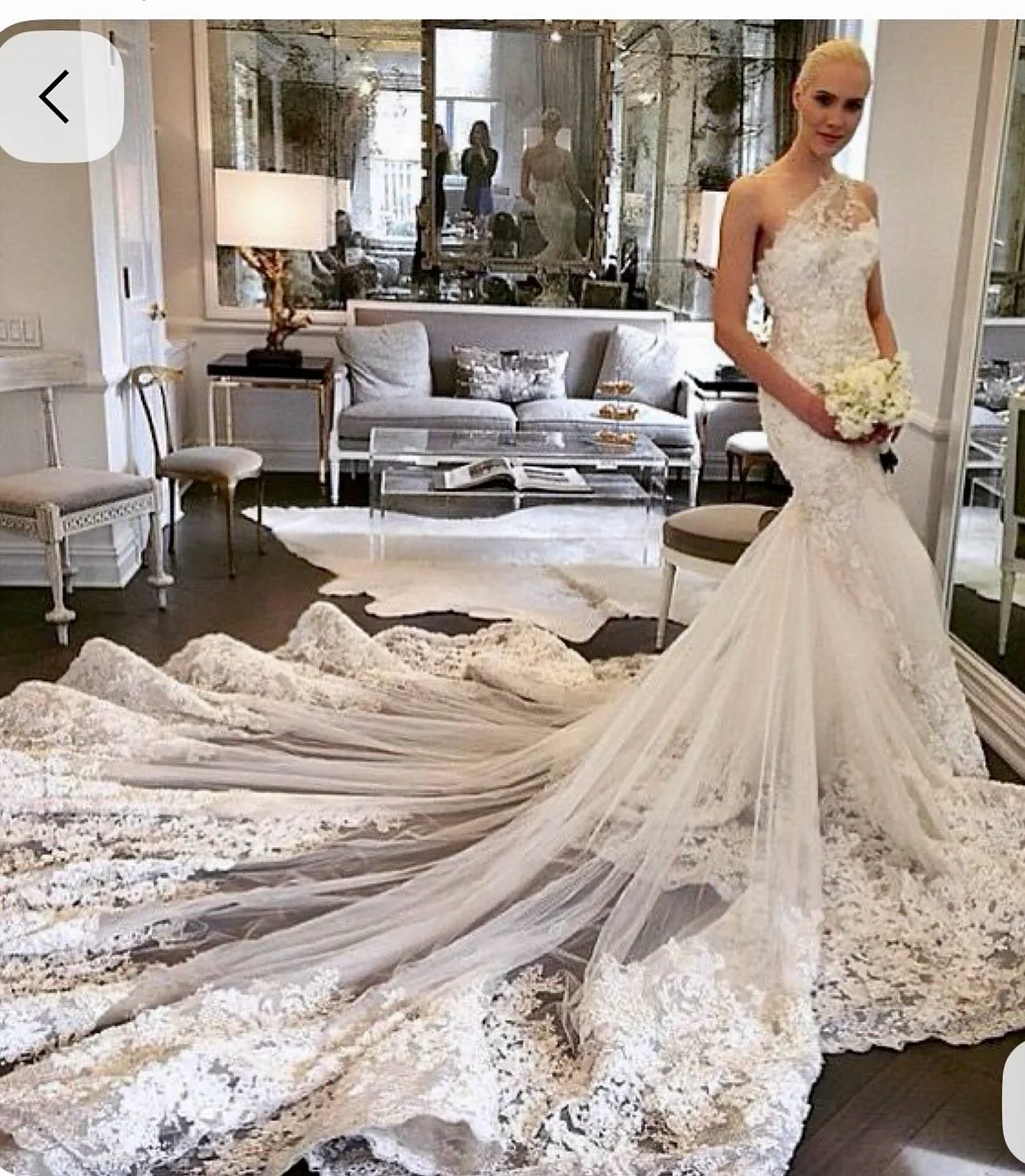 Now THAT&rsquo;s a couture train! And yes, there is a matching veil that will take your breath away.