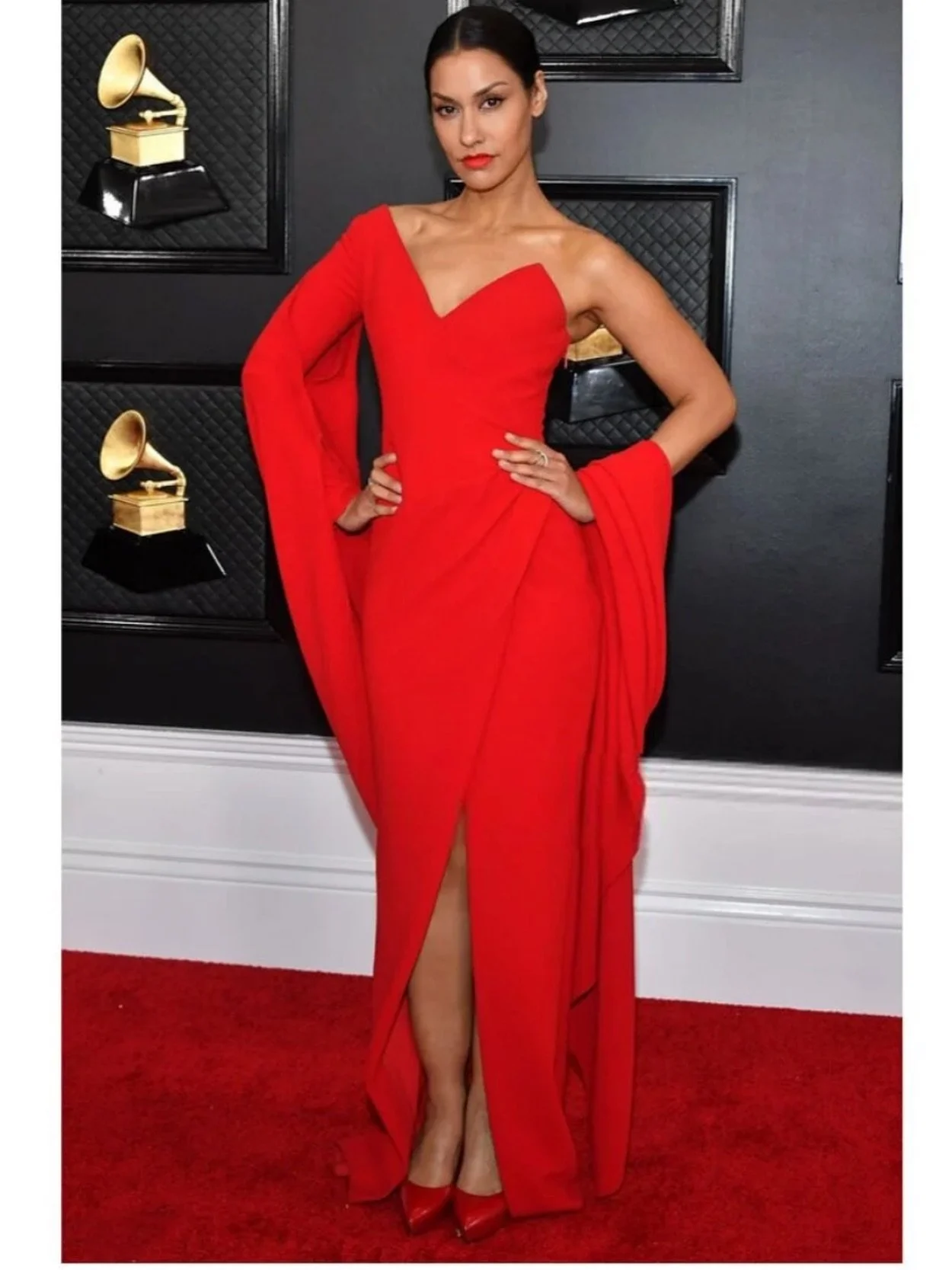 REMEMBERING PAST RED CARPET MOMENTS AT THE GRAMMYS For the 62nd Grammy Awards, Janina Gavankar wore a stunning red gown by Romona Keveza. The dress was a vibrant &lsquo;red hot Hollywood Glam&rsquo; look, which many outlets featured in their red carp