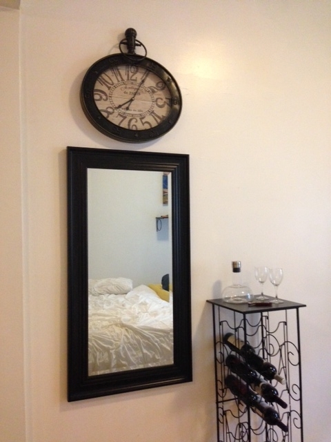 Grandfather Clock (Homegoods) = $59. Mirror (Homegoods) = $50. WIne Rack (Amazon) = $45.