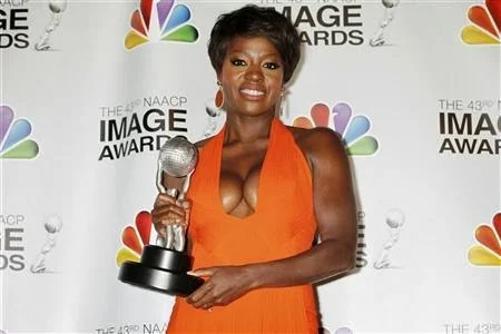 Actress Viola Davis poses with the Image Award she won as best actress in a motion picture for her role in ''The Help'' at the 43rd NAACP Image Awards in Los Angeles, California February 17, 2012. CREDIT: REUTERS/FRED PROUSER