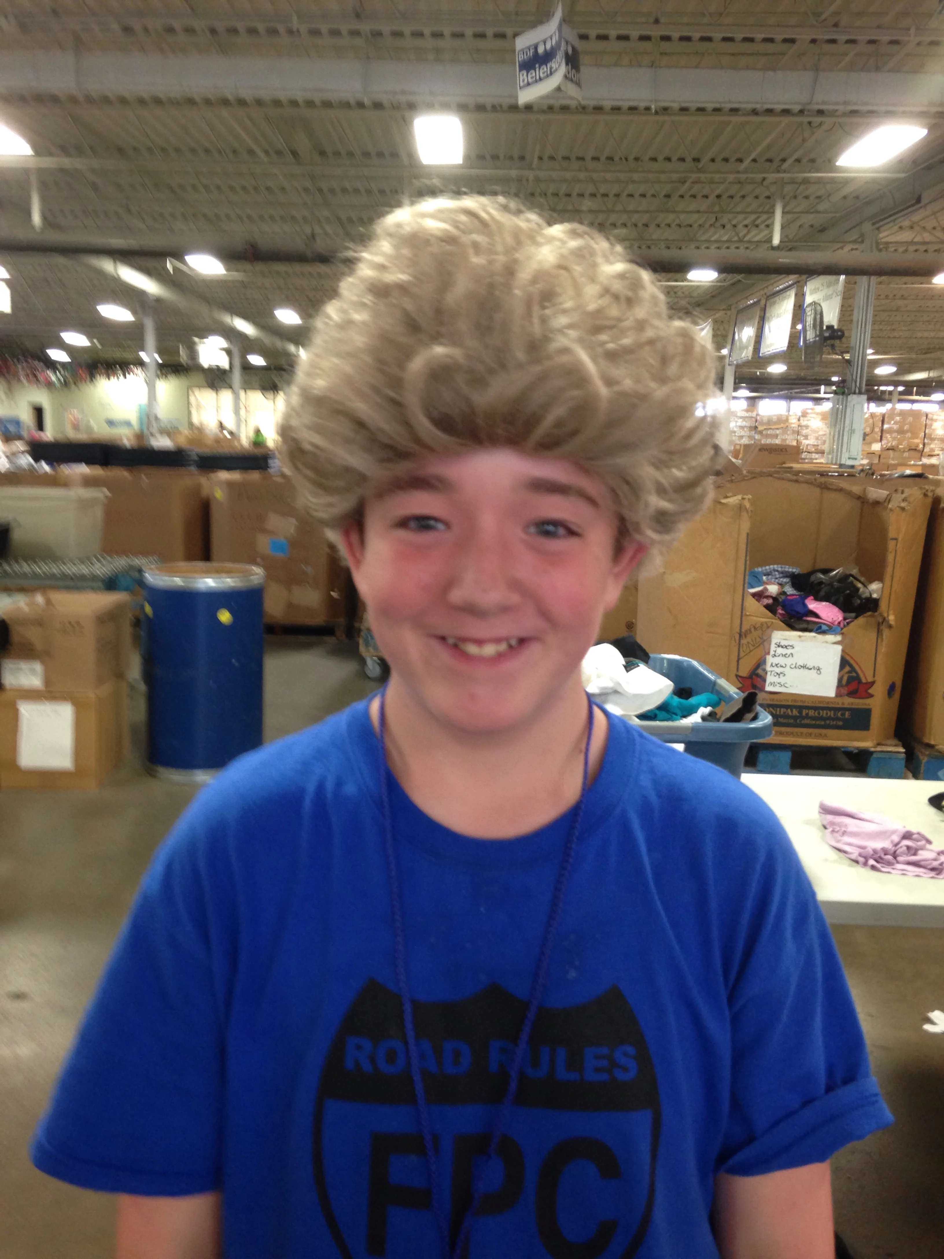 Sorting clothes... And wigs?
