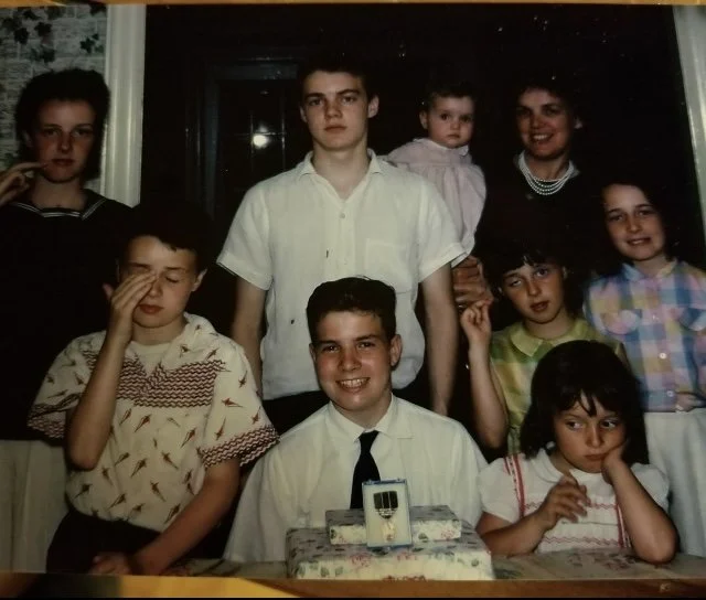 Steve in the center of the family! 
"We may not have it all together, but together we have it all."