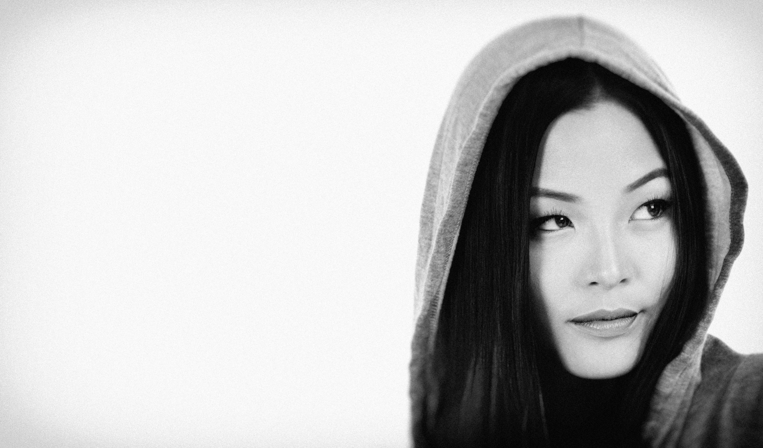 Two weeks ago, I got to work with the lovely Saria Chen. She's so much fun to work with. Unfortunately I was quite under the weather, and the shoot didn't go as I'd planned...which doesn't matter as one cannot take a bad photo of Saria. I'd planned on shooting some photos on location, but my illness put a damper on that. All shots were done in the studio. This is with a large 4'xx6' Profoto softbox and a smaller softbox as a fill. The background was blown out, and I added the grain and vignette with NIK and Photoshop.