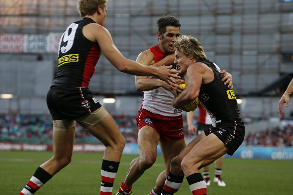Josh Kennedy from the Swans lays another tackle